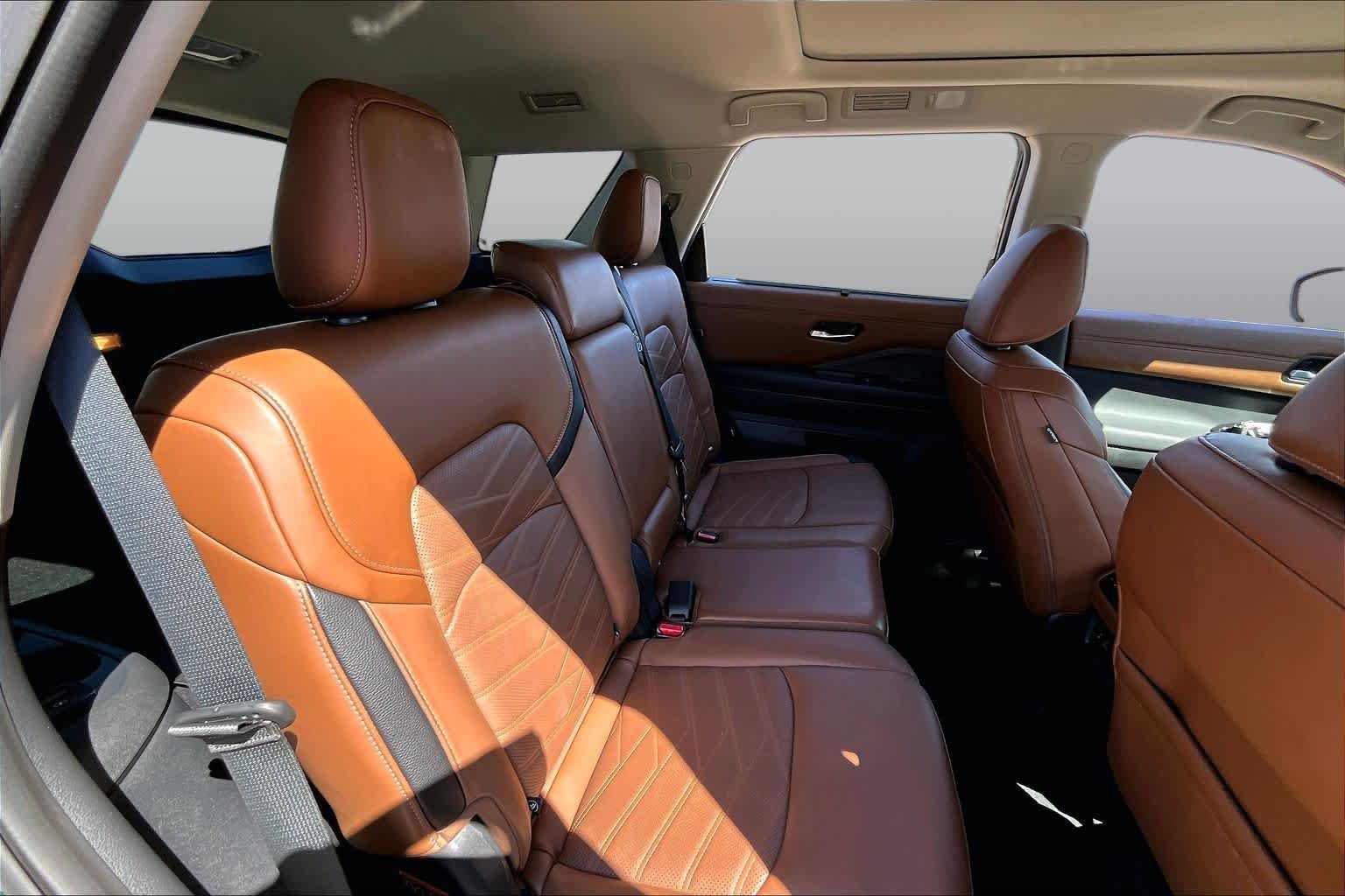 2025 Nissan Pathfinder Platinum Obsidian Green Pearl at Mac Haik Ford