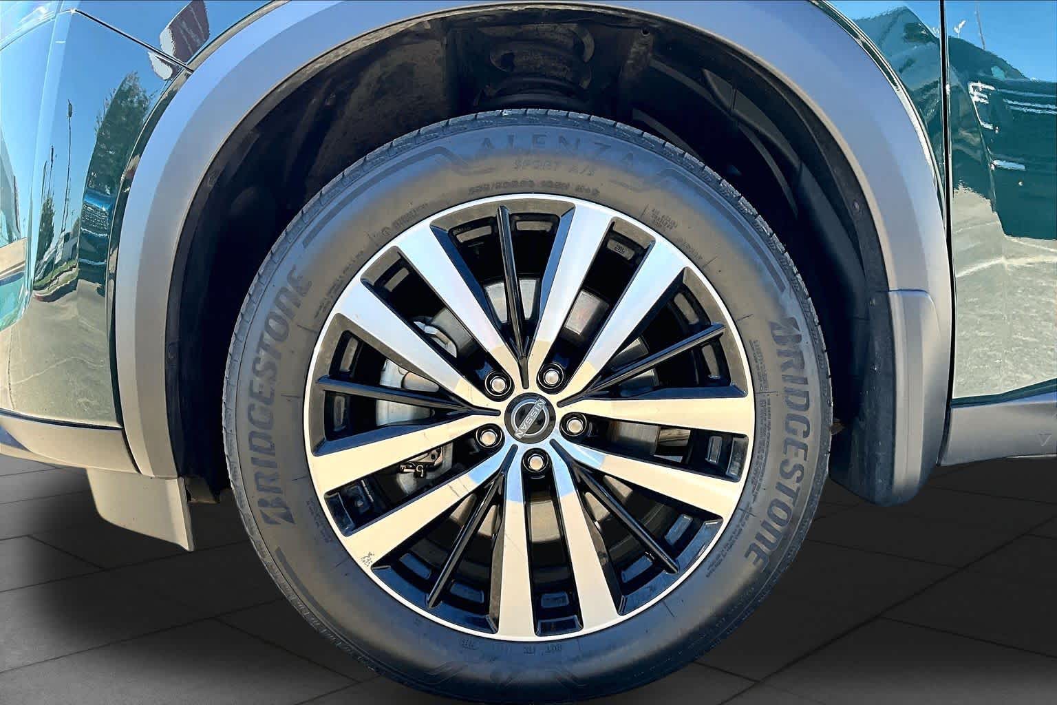 2025 Nissan Pathfinder Platinum Obsidian Green Pearl at Mac Haik Ford