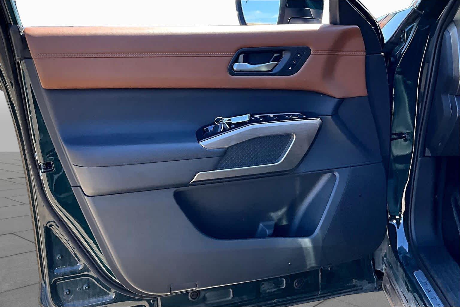 2025 Nissan Pathfinder Platinum Obsidian Green Pearl at Mac Haik Ford
