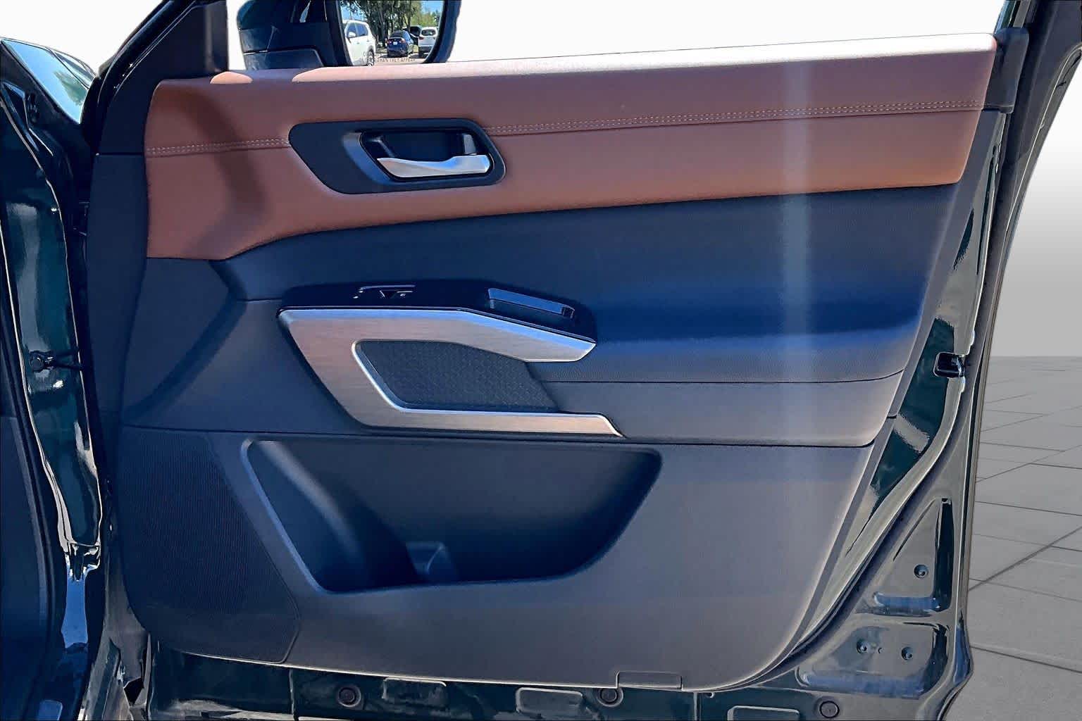 2025 Nissan Pathfinder Platinum Obsidian Green Pearl at Mac Haik Ford