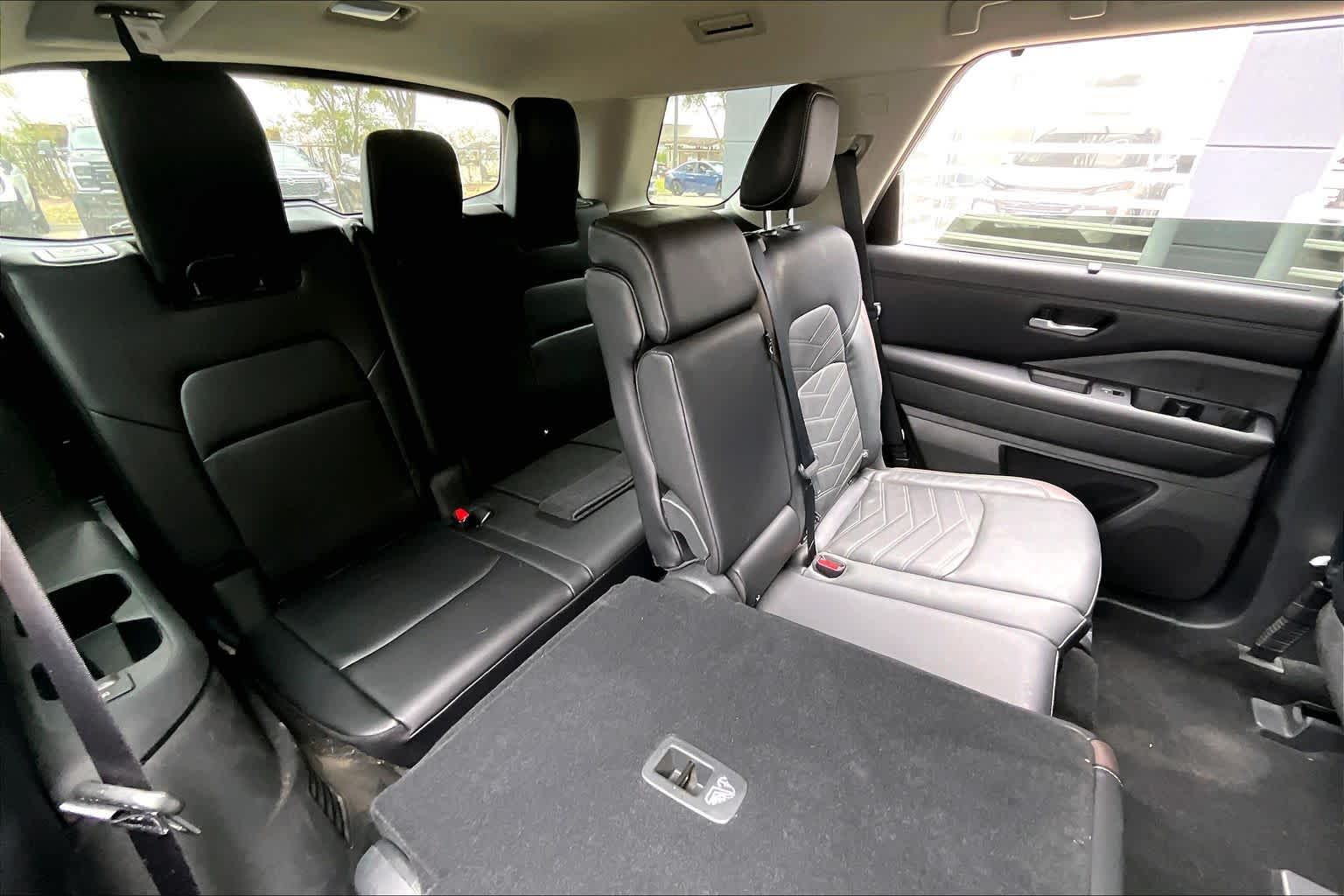 2024 Nissan Pathfinder Platinum Obsidian Green Pearl/Super Black at Sterling McCall Nissan