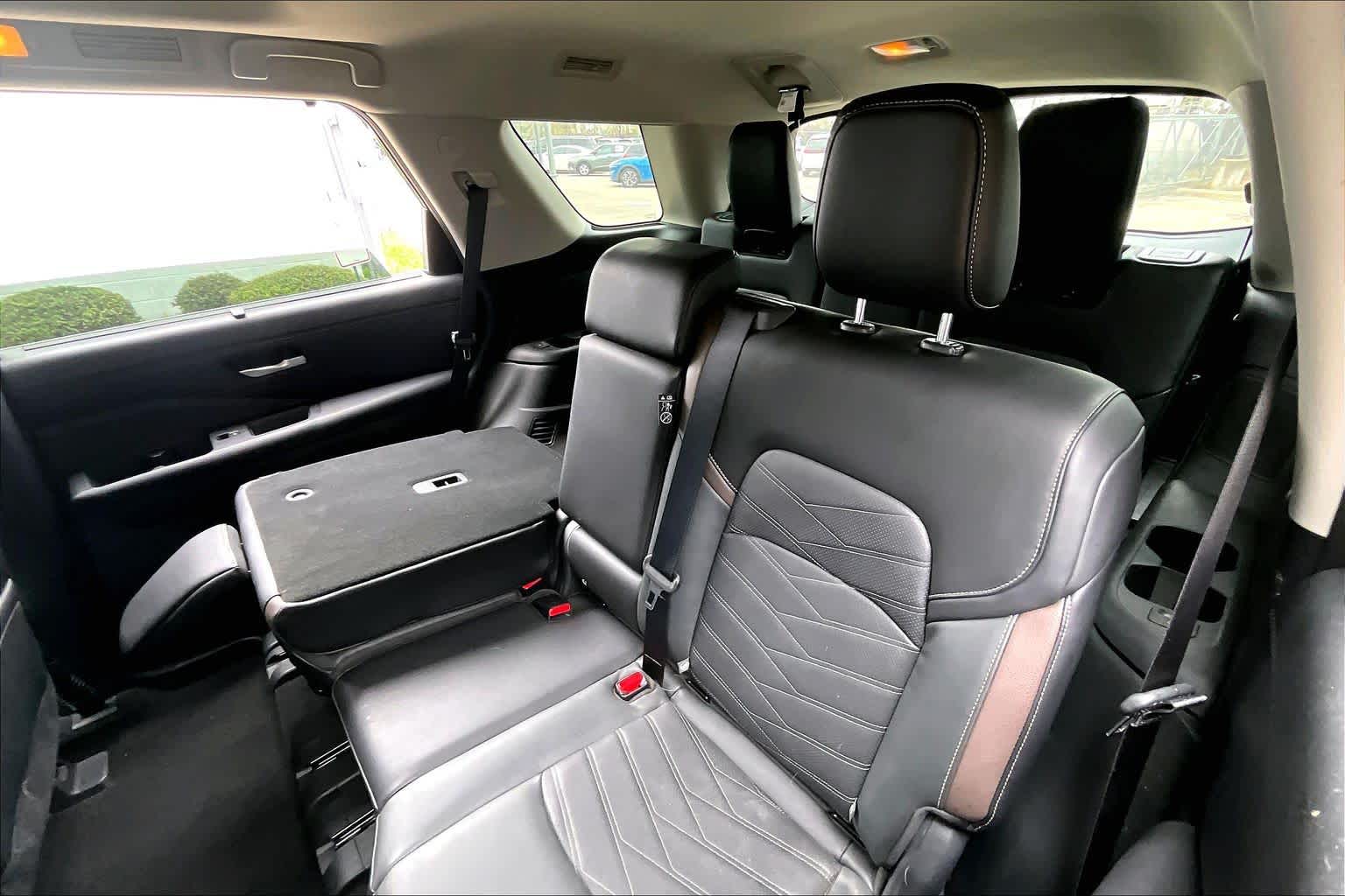 2024 Nissan Pathfinder Platinum Obsidian Green Pearl/Super Black at Sterling McCall Nissan