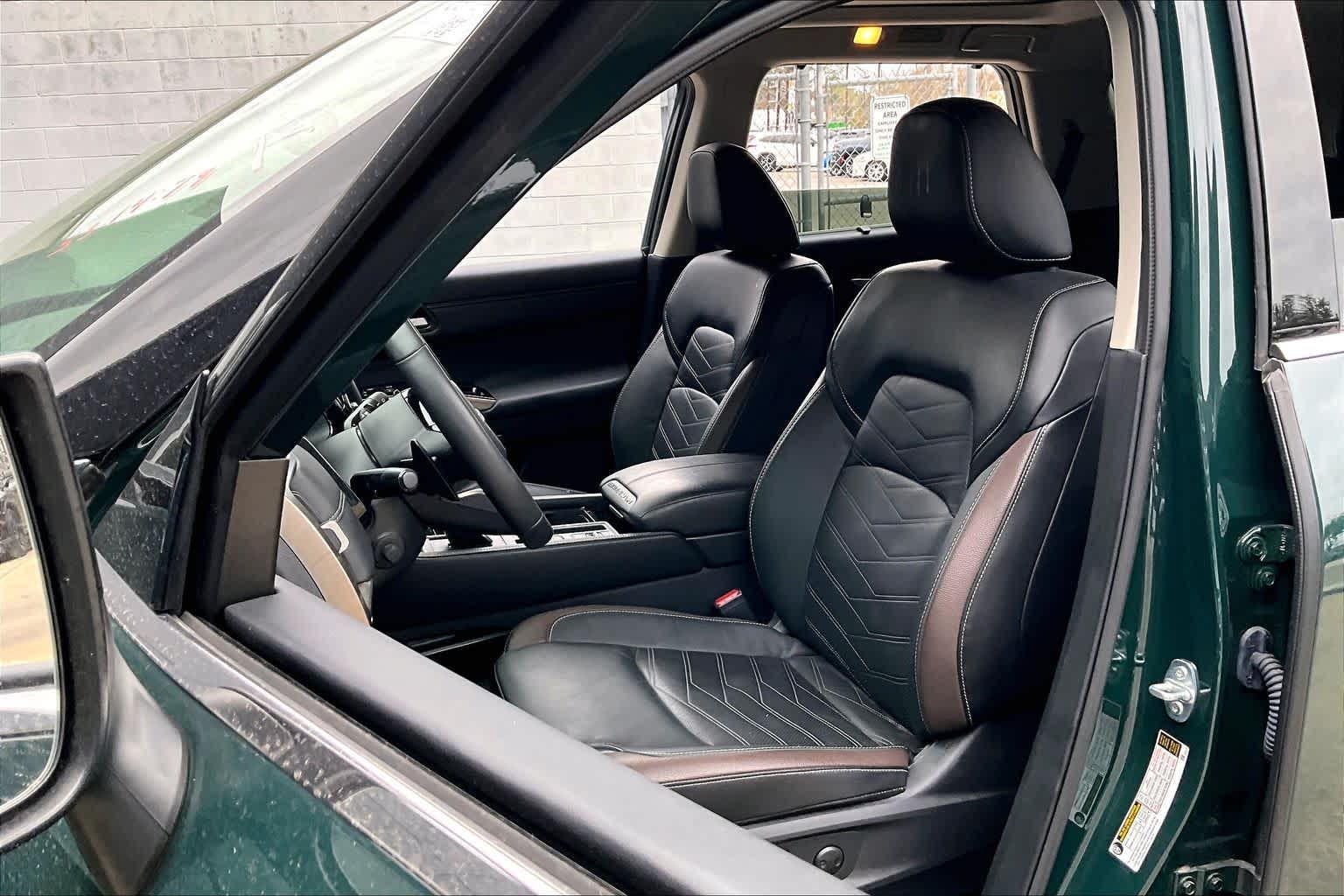 2024 Nissan Pathfinder Platinum Obsidian Green Pearl/Super Black at Sterling McCall Nissan