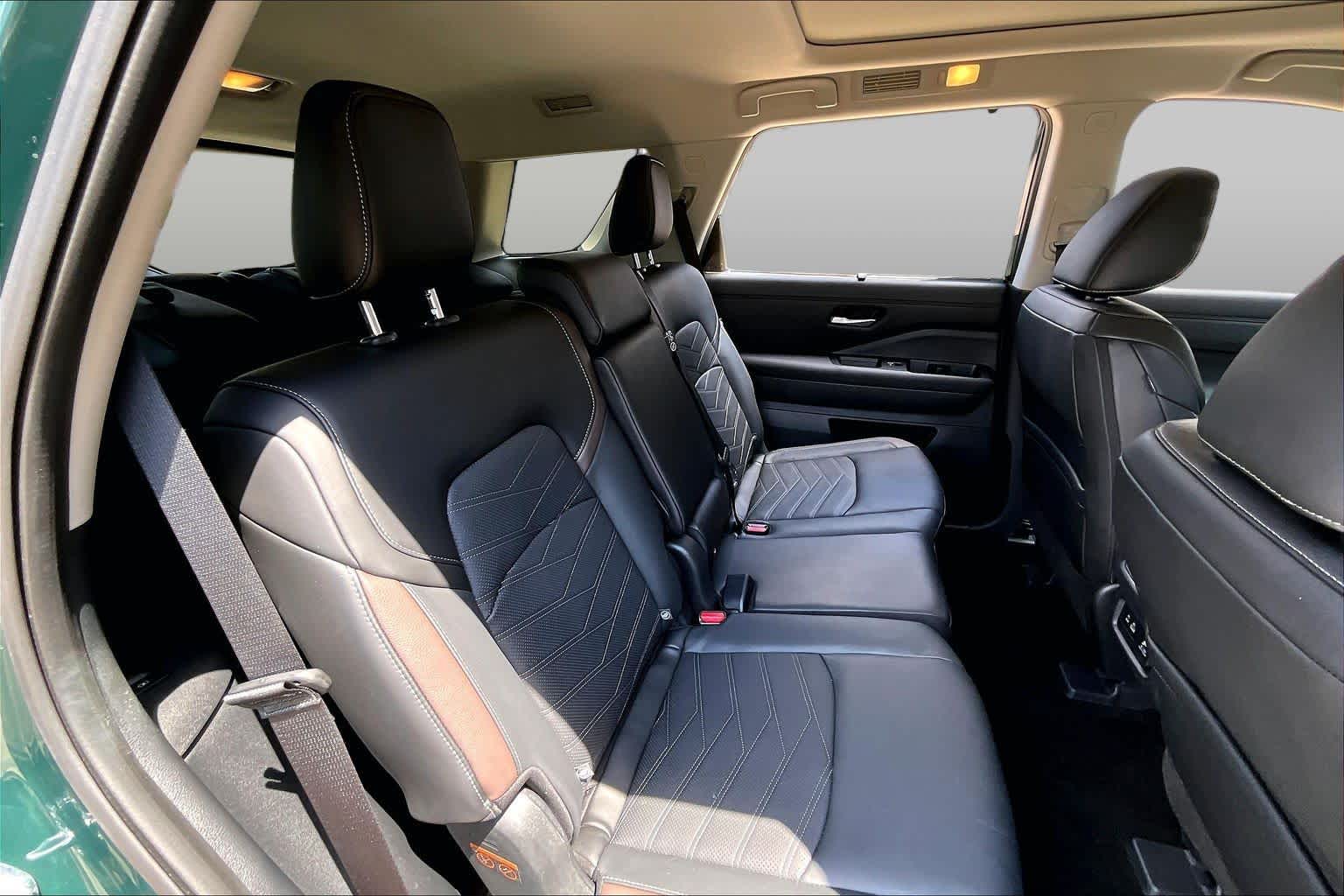 2025 Nissan Pathfinder Platinum Obsidian Green Pearl at Sterling McCall Nissan