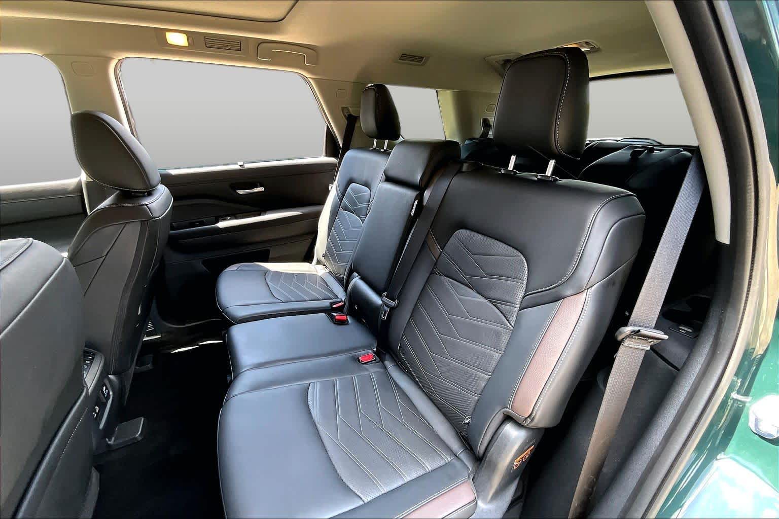 2025 Nissan Pathfinder Platinum Obsidian Green Pearl at Sterling McCall Nissan