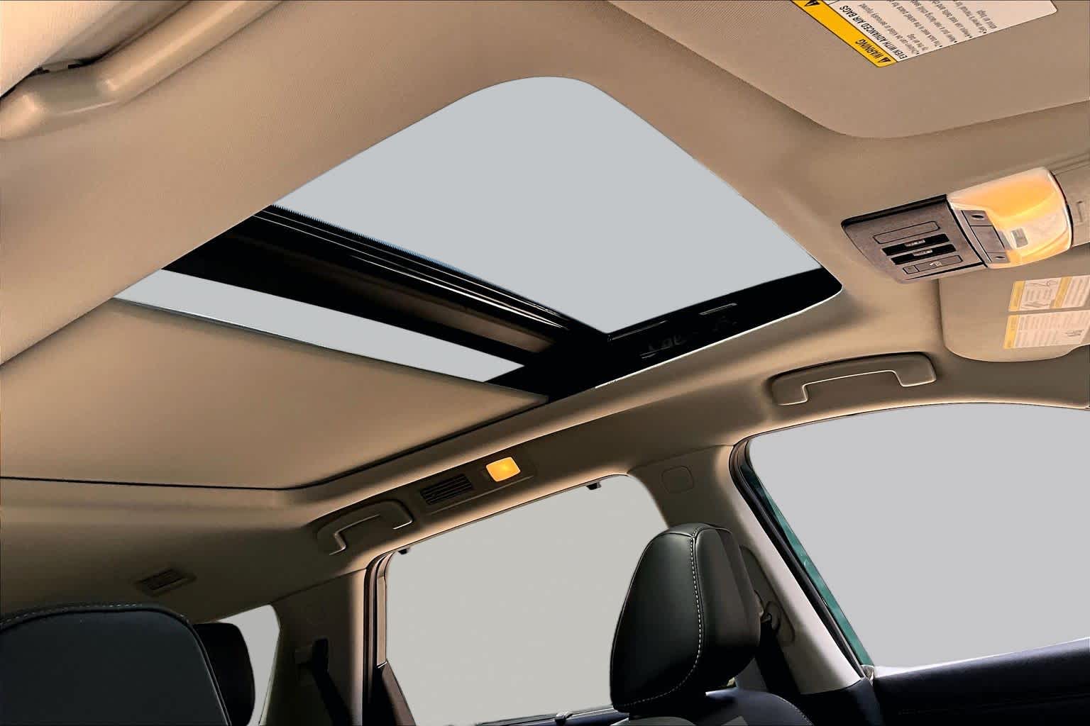 2025 Nissan Pathfinder Platinum Obsidian Green Pearl at Sterling McCall Nissan