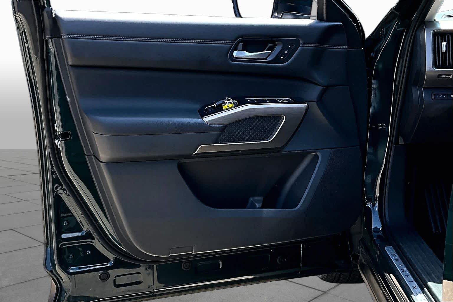 2025 Nissan Pathfinder Platinum Obsidian Green Pearl at Sterling McCall Nissan