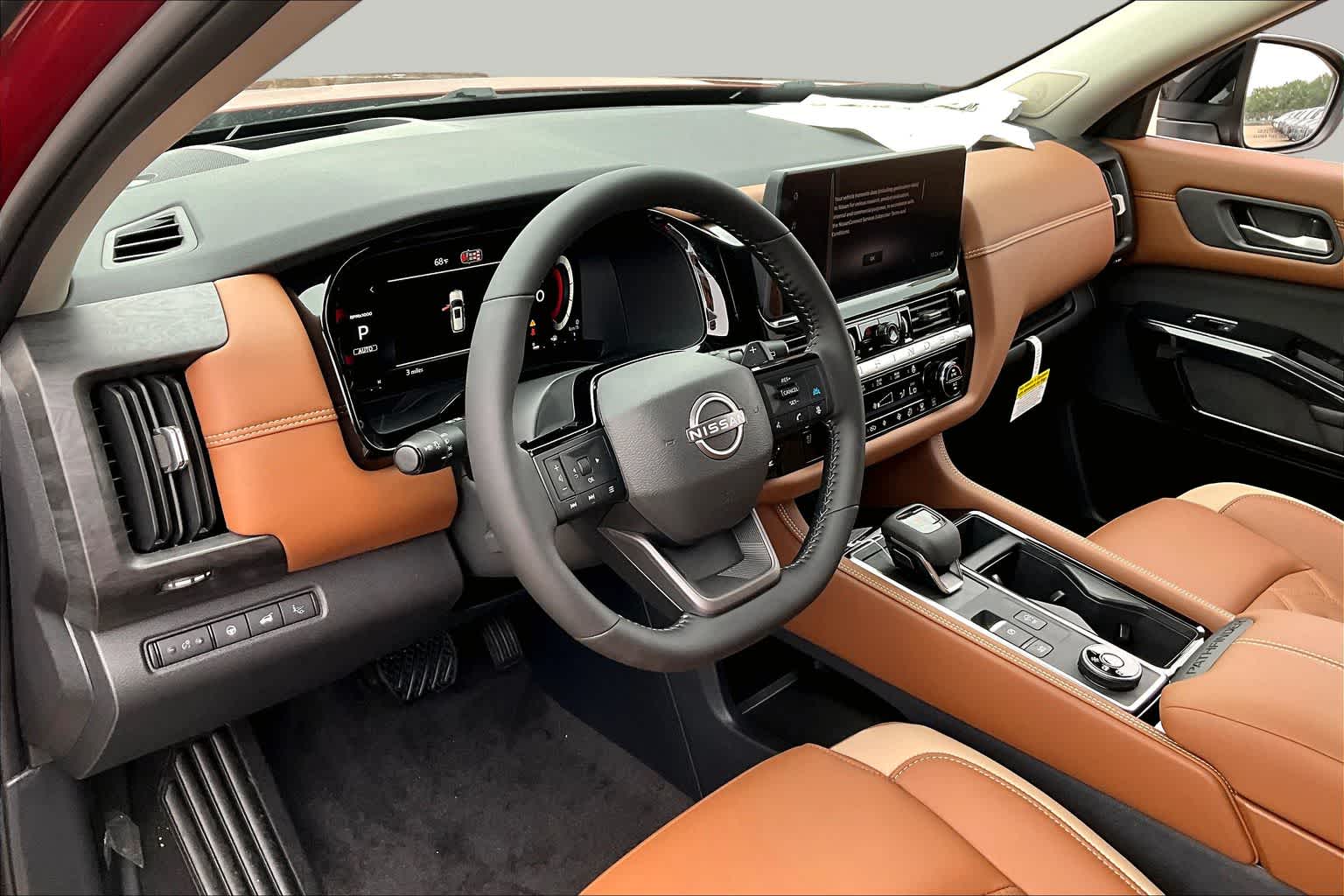 2026 Nissan Pathfinder Platinum Scarlet Ember Tintcoat/Super Black at Sterling McCall Nissan