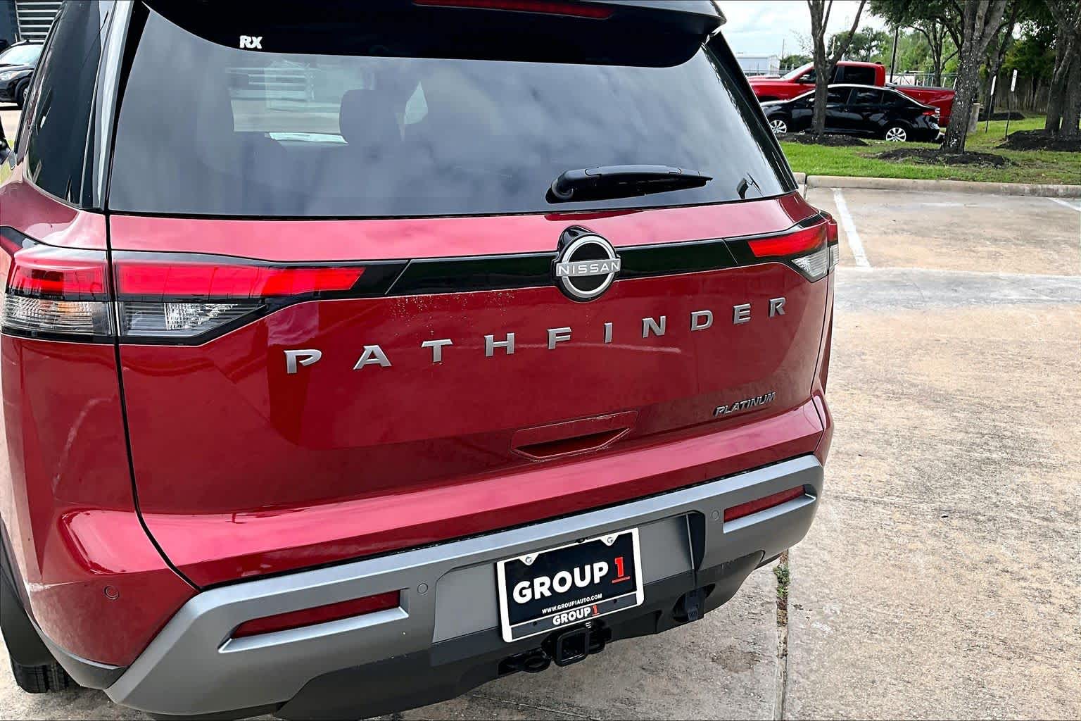 2026 Nissan Pathfinder Platinum Scarlet Ember Tintcoat/Super Black at Baytown Ford
