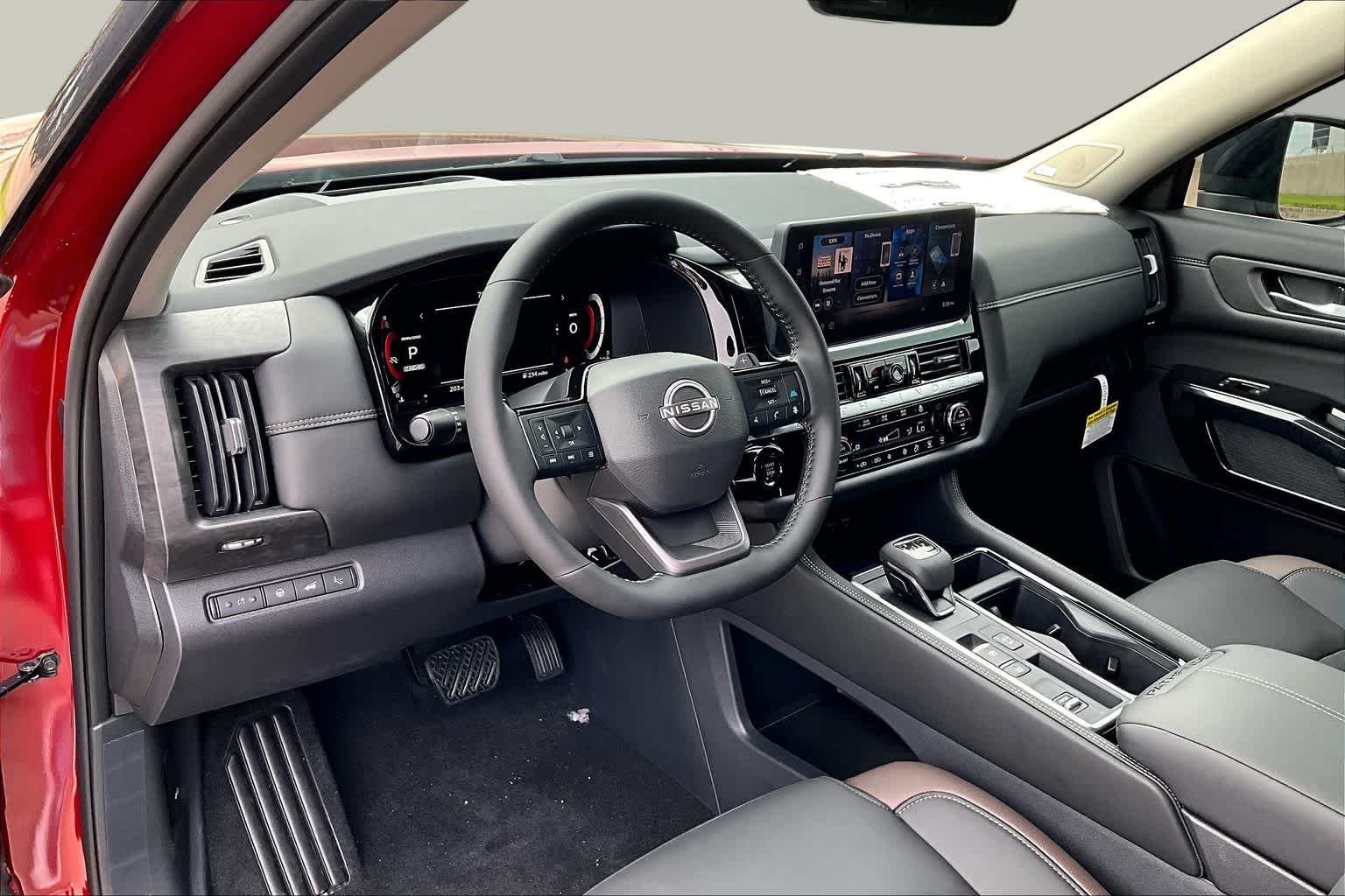 2026 Nissan Pathfinder Platinum Scarlet Ember Tintcoat/Super Black at Baytown Ford