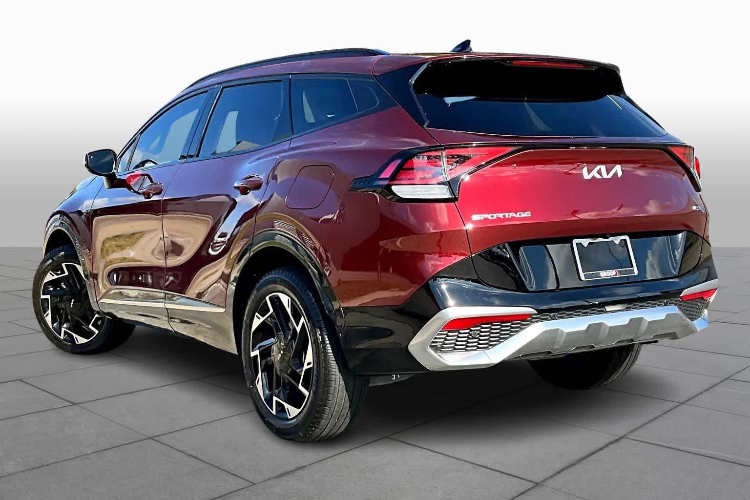 2024 Kia Sportage SX-Prestige Dawning Red at Turner Chevrolet