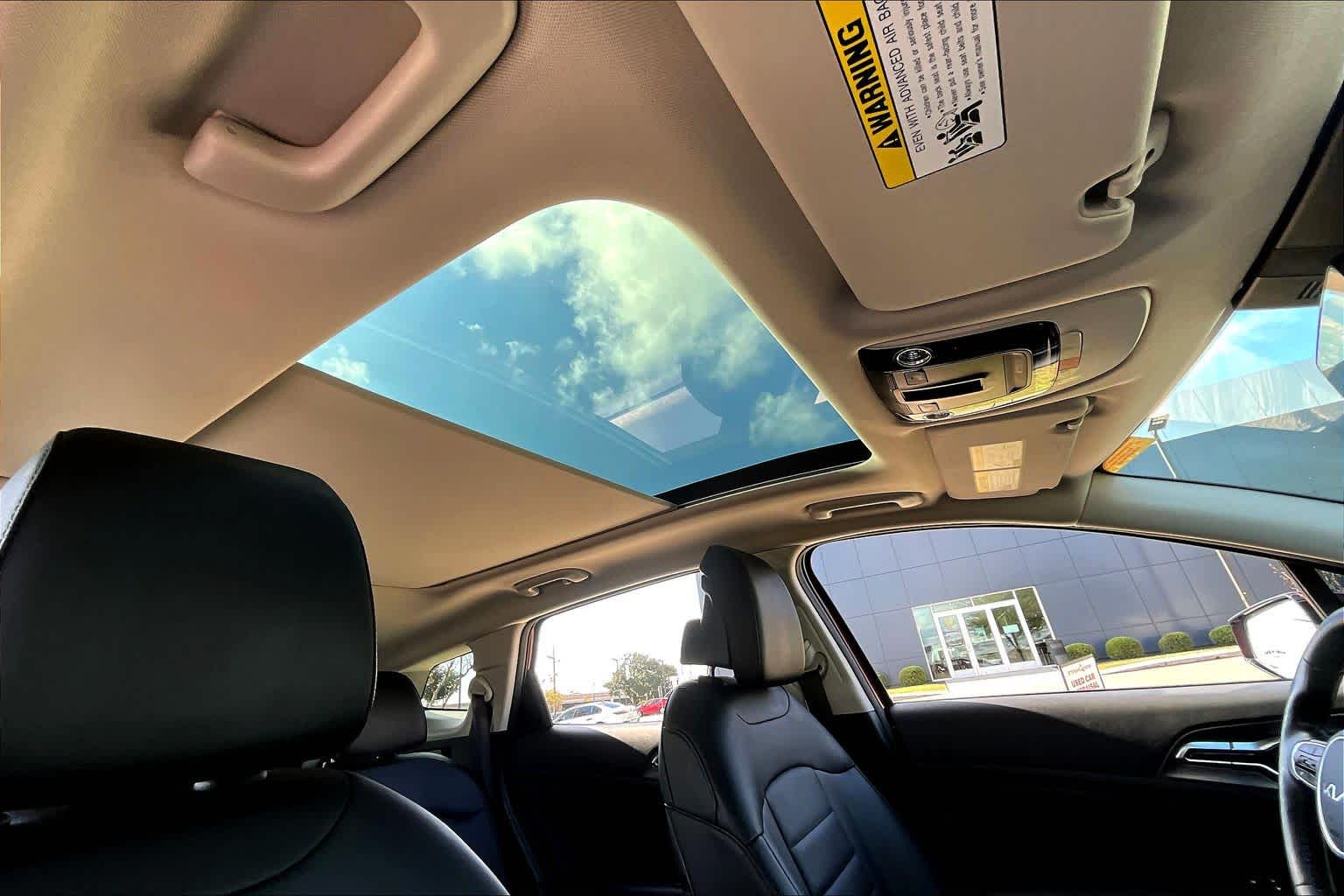 2024 Kia Sportage SX-Prestige Dawning Red at Turner Chevrolet