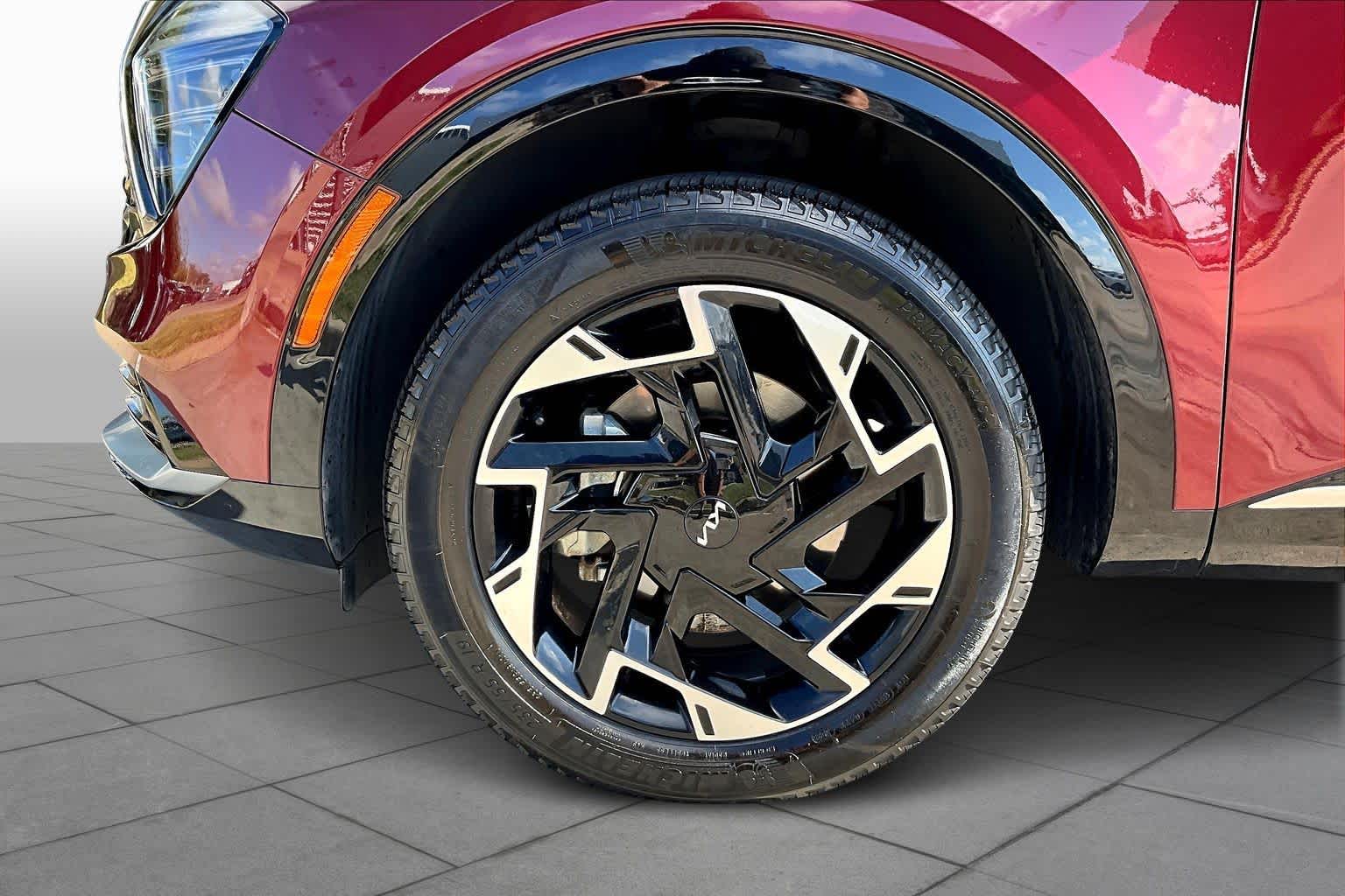 2024 Kia Sportage SX-Prestige Dawning Red at Turner Chevrolet