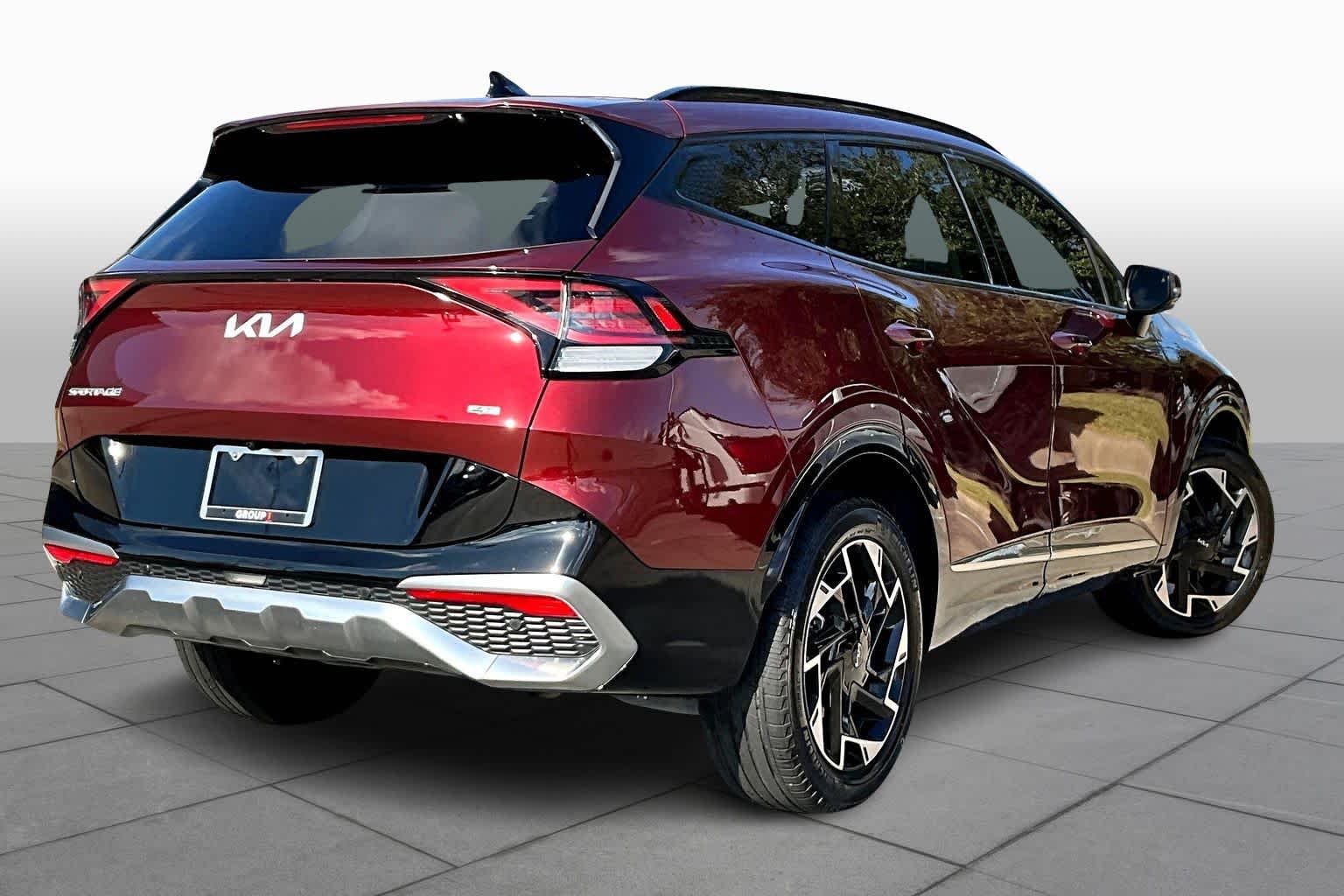 2024 Kia Sportage SX-Prestige Dawning Red at Turner Chevrolet