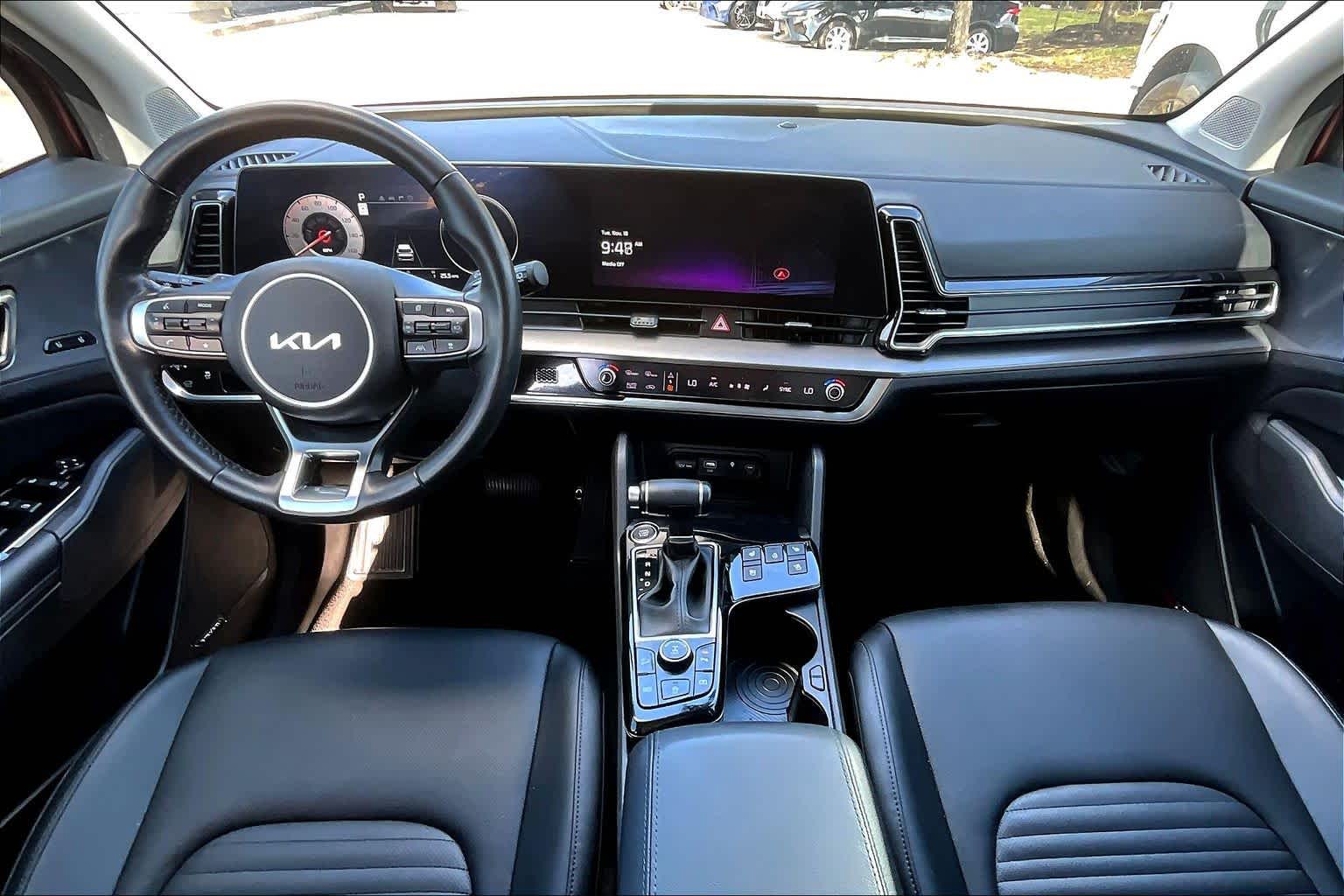 2024 Kia Sportage SX-Prestige Dawning Red at Turner Chevrolet