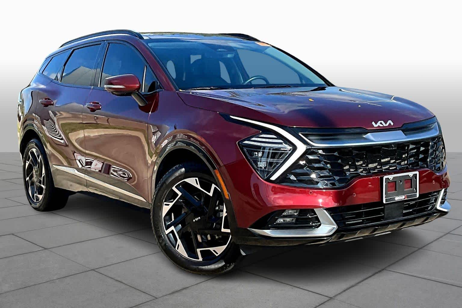 2024 Kia Sportage SX-Prestige Dawning Red at Turner Chevrolet