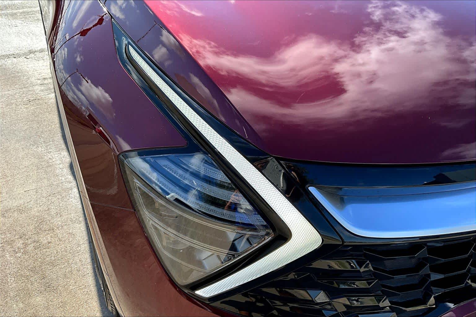 2024 Kia Sportage SX-Prestige Dawning Red at Turner Chevrolet