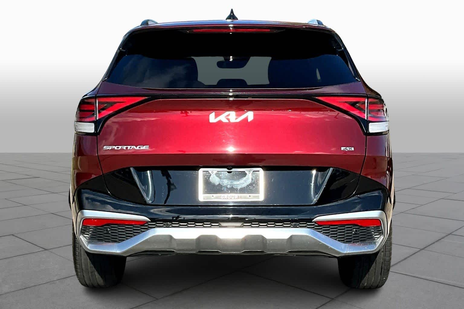 2024 Kia Sportage SX-Prestige Dawning Red at Turner Chevrolet