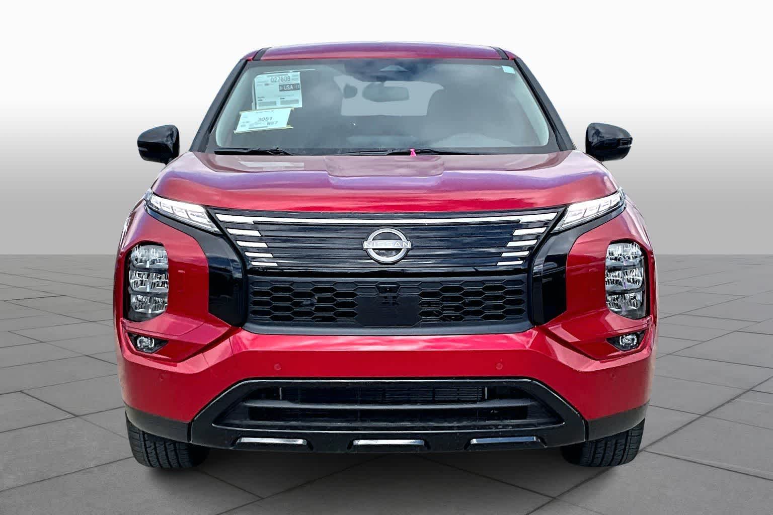 2026 Nissan Rogue Plug-In Hybrid SL Royal Red at Sterling McCall Nissan