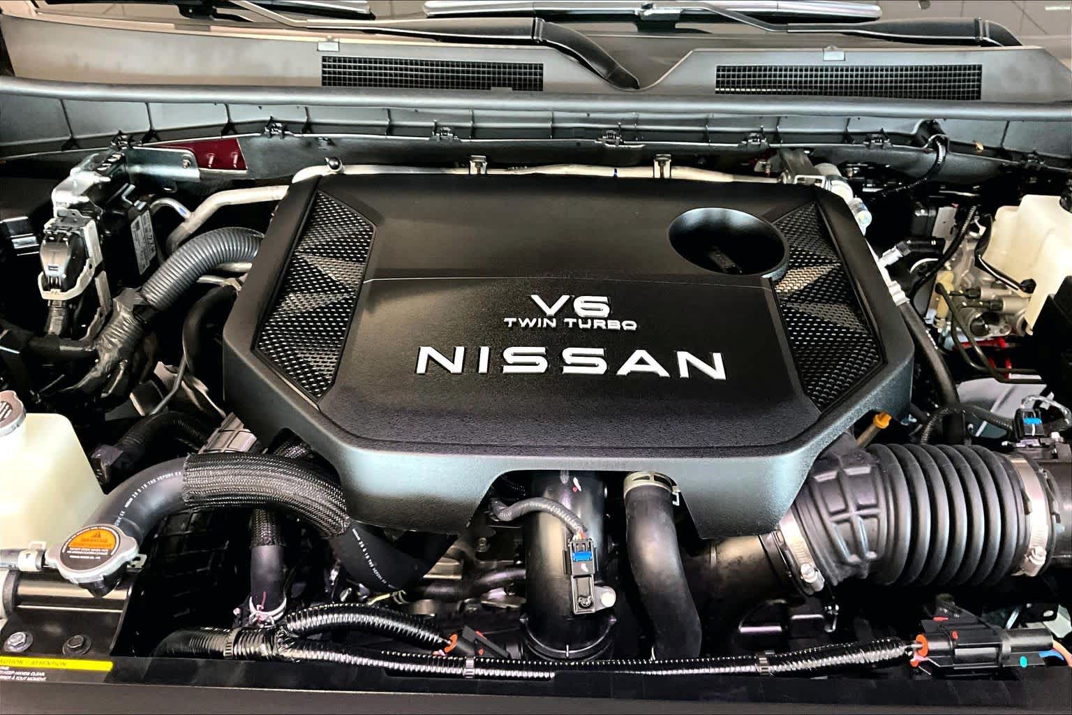 2026 Nissan Armada Platinum Coulis Red Pearl/Super Black at Sterling McCall Nissan