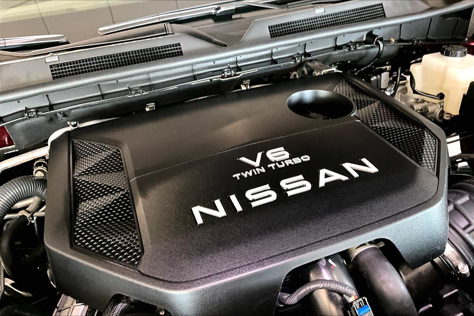 2026 Nissan Armada Platinum Coulis Red Pearl/Super Black at Sterling McCall Nissan