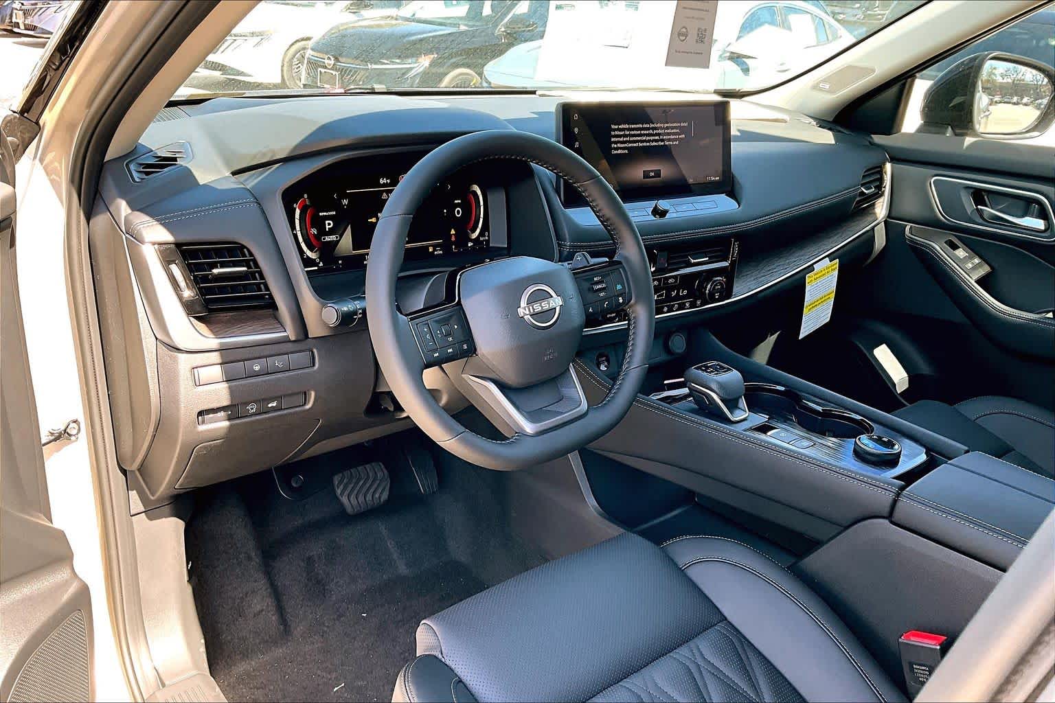 2026 Nissan Rogue Platinum Champagne Silver Metallic/Super Black at Sterling McCall Nissan