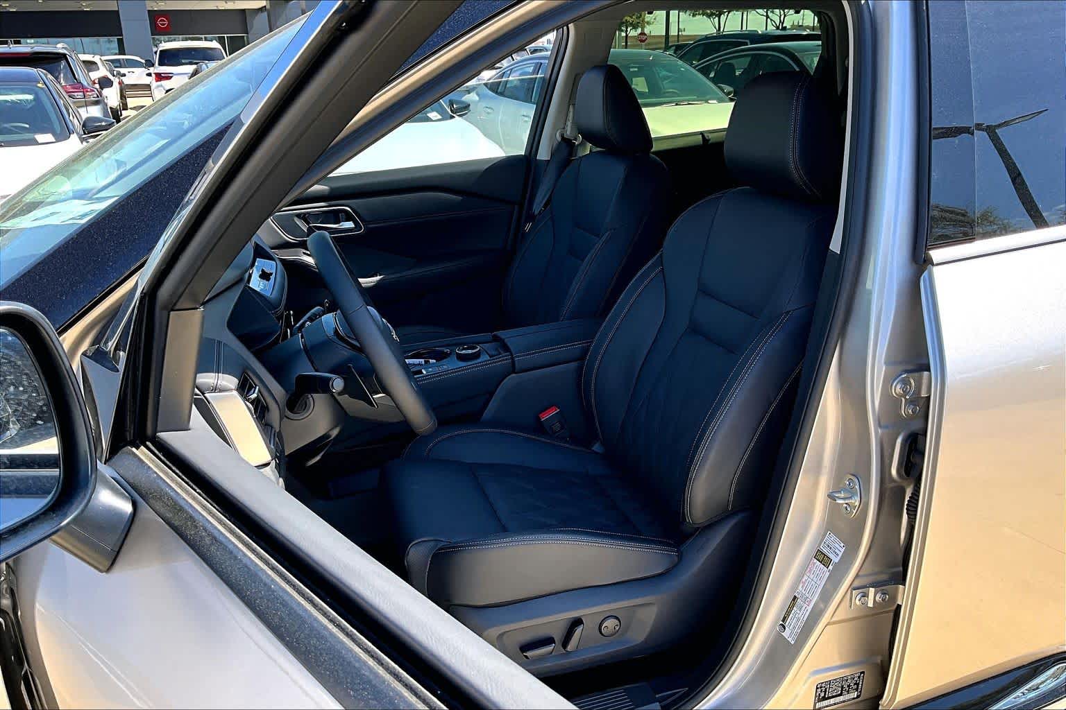 2026 Nissan Rogue Platinum Champagne Silver Metallic/Super Black at Sterling McCall Nissan