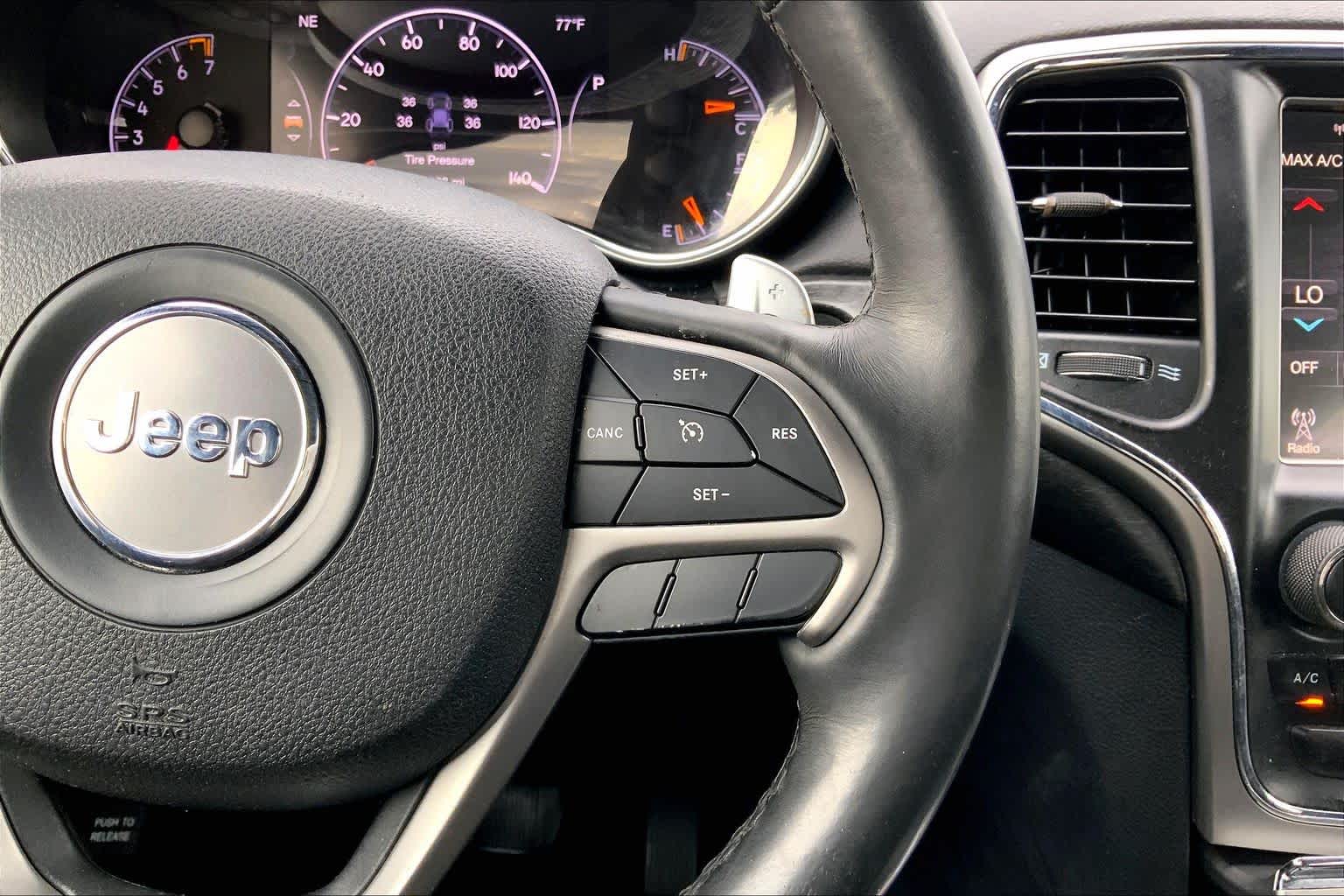2017 Jeep Grand Cherokee Altitude Diamond Black Crystal Pearlcoat at AutoNation Toyota Gulf Fwy