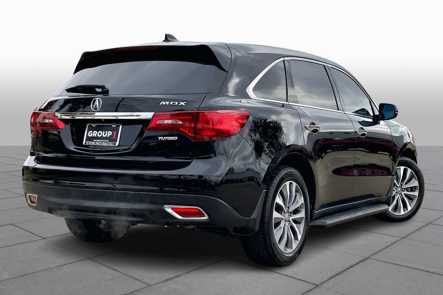 2016 Acura MDX w/Tech Crystal Black Pearl at Sterling McCall Nissan