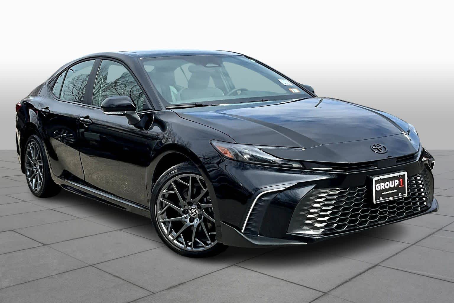 View vehicle photo 3