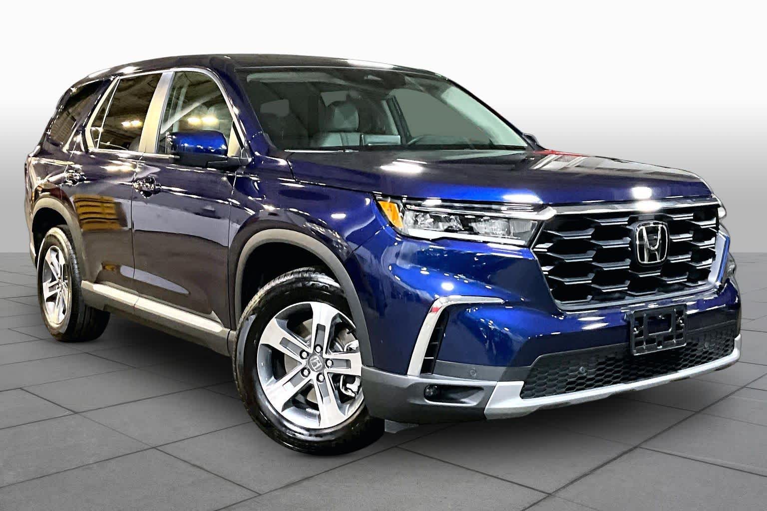View vehicle photo 5