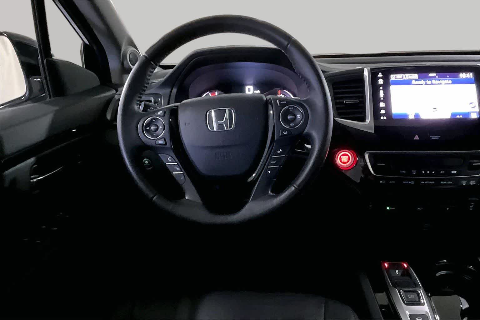 View vehicle photo 5