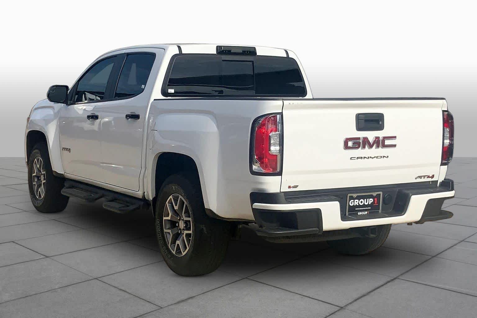 Used 2021 SUMMIT WHITE GMC 4WD AT4 w/Cloth image 12