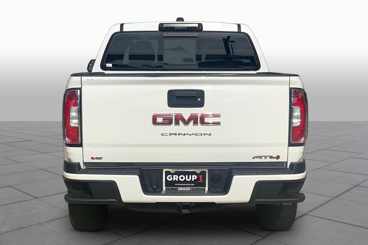 Used 2021 SUMMIT WHITE GMC 4WD AT4 w/Cloth image 5
