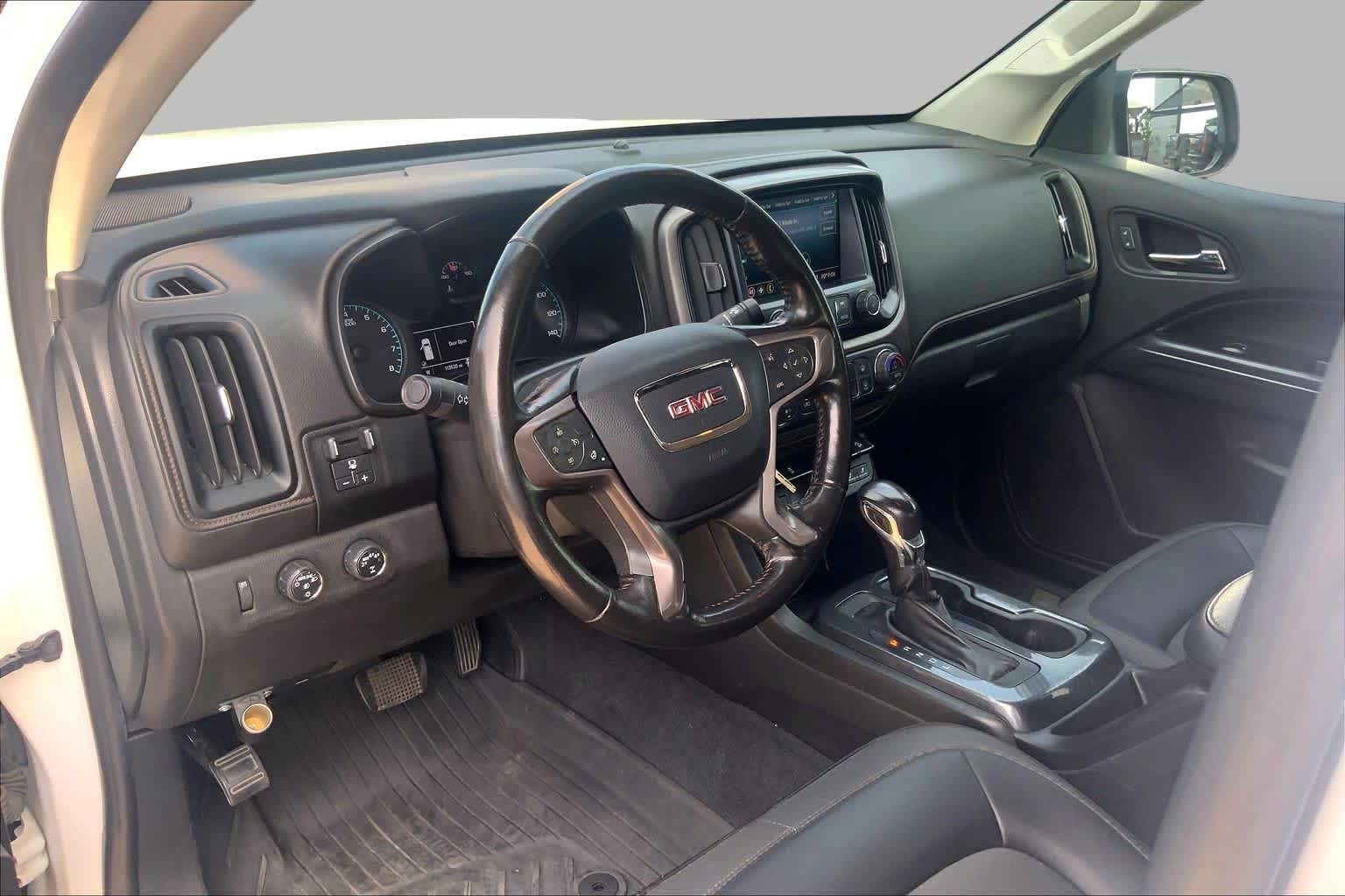 Used 2021 SUMMIT WHITE GMC 4WD AT4 w/Cloth image 17