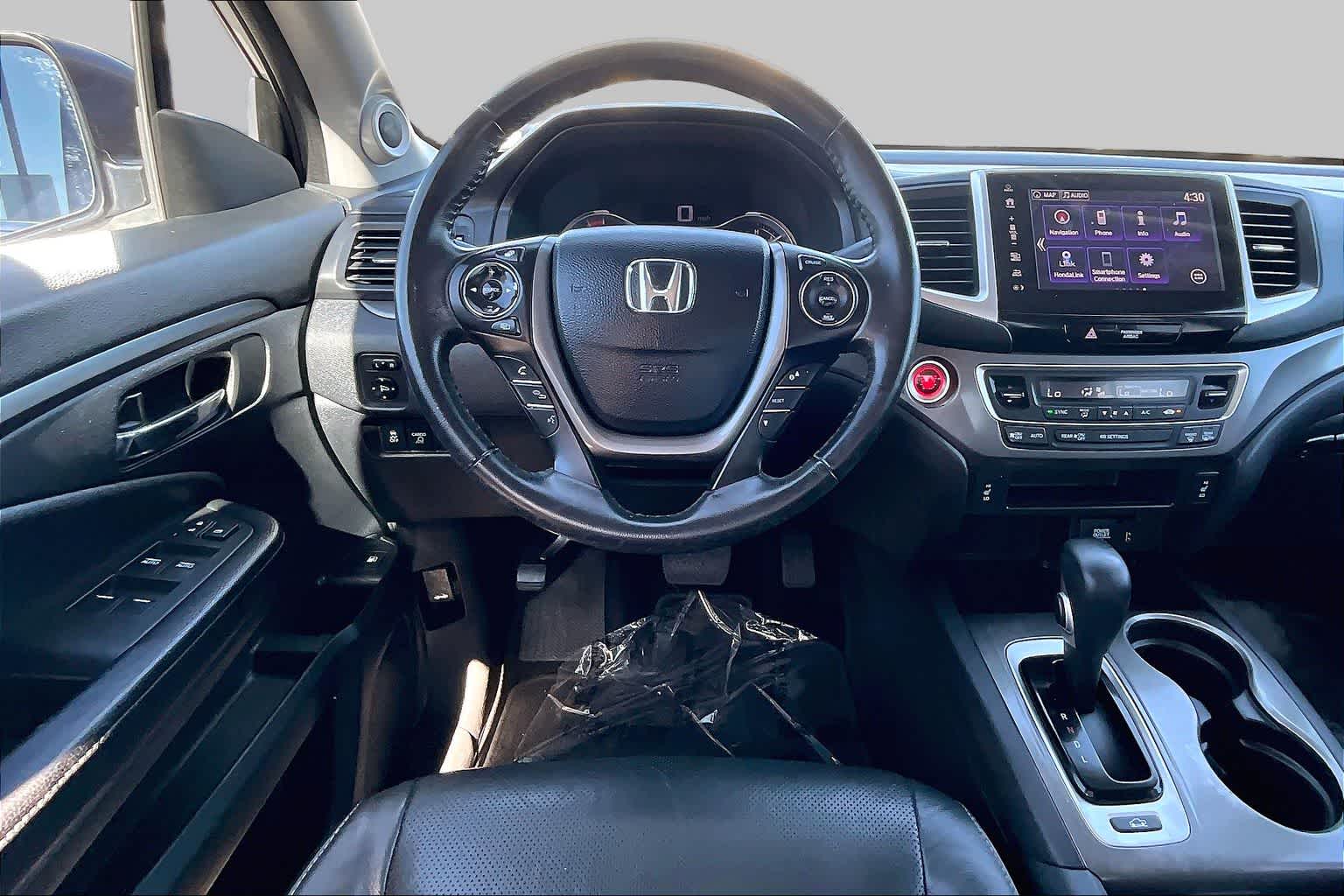 View vehicle photo 5