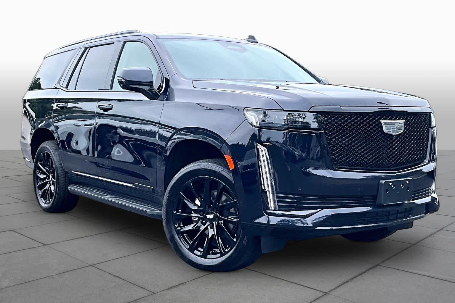 Used 2024 Dark Moon Blue Metallic Cadillac Sport Platinum image 3