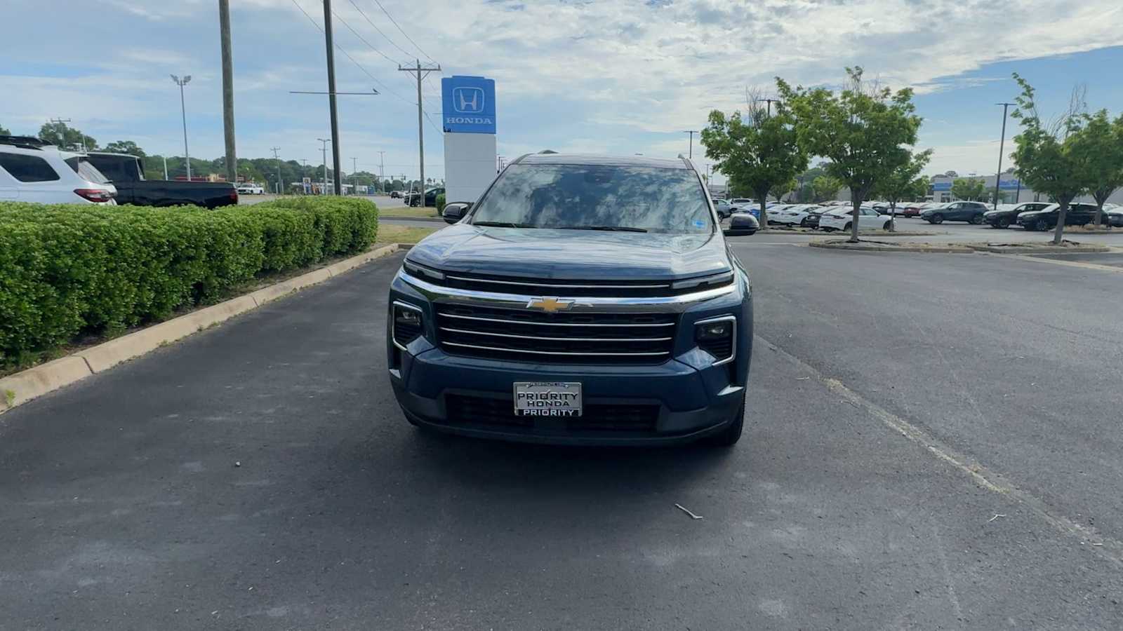 View vehicle photo 3
