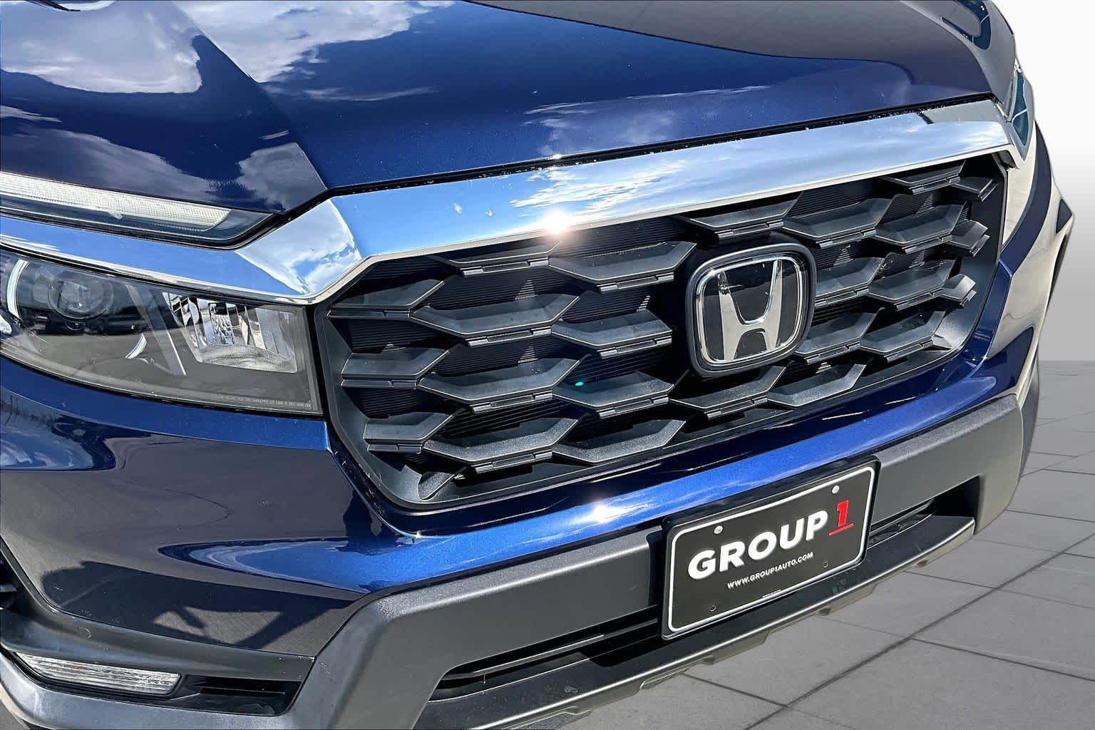 2023 Honda Passport EX-L Obsidian Blue Pearl at Team Toyota