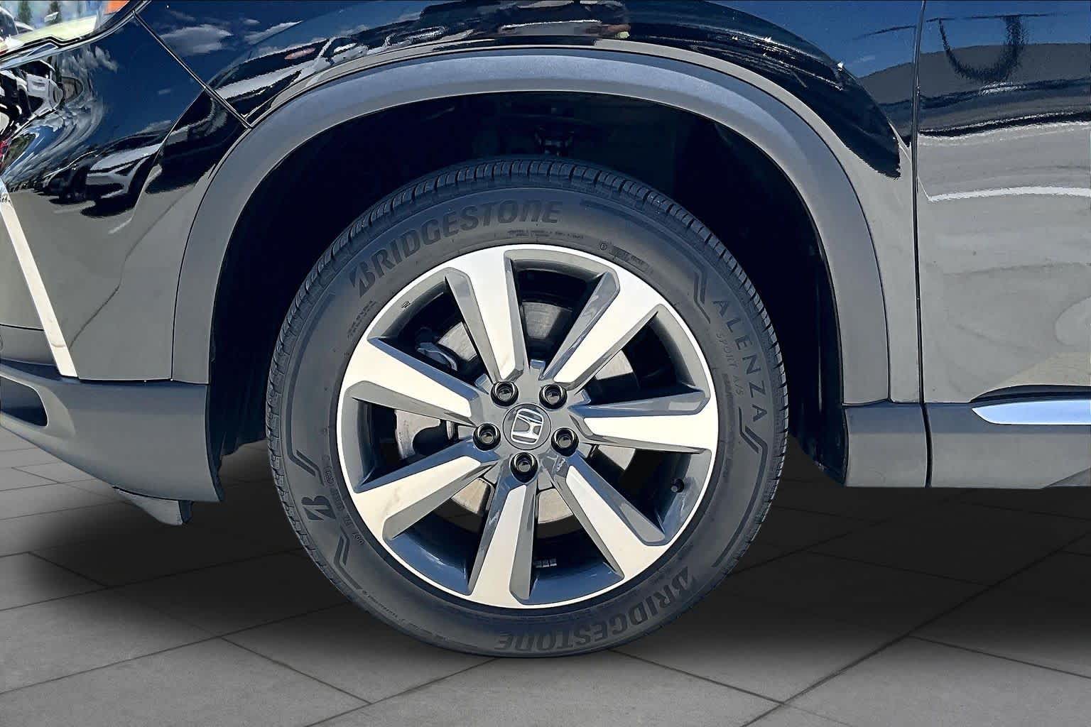 2024 Honda Pilot Touring Crystal Black Pearl at Tomball Ford