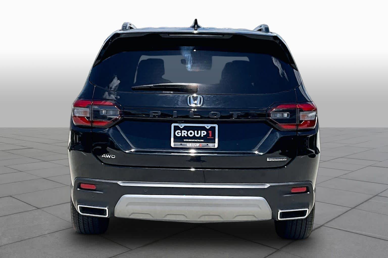 2024 Honda Pilot Touring Crystal Black Pearl at Tomball Ford