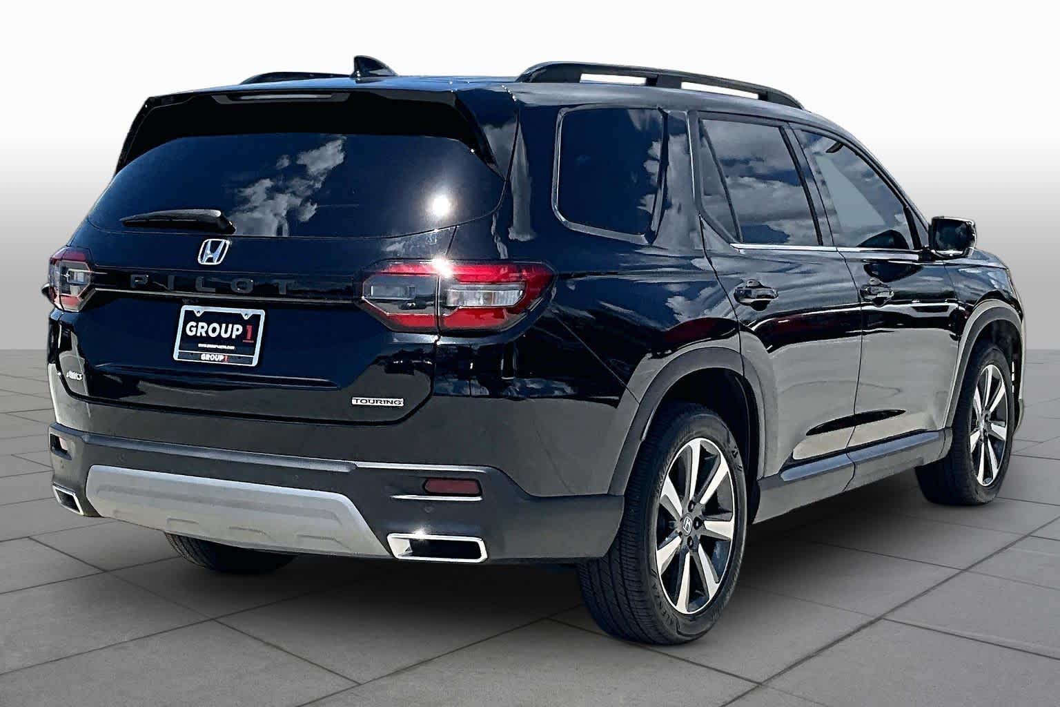 2024 Honda Pilot Touring Crystal Black Pearl at Tomball Ford