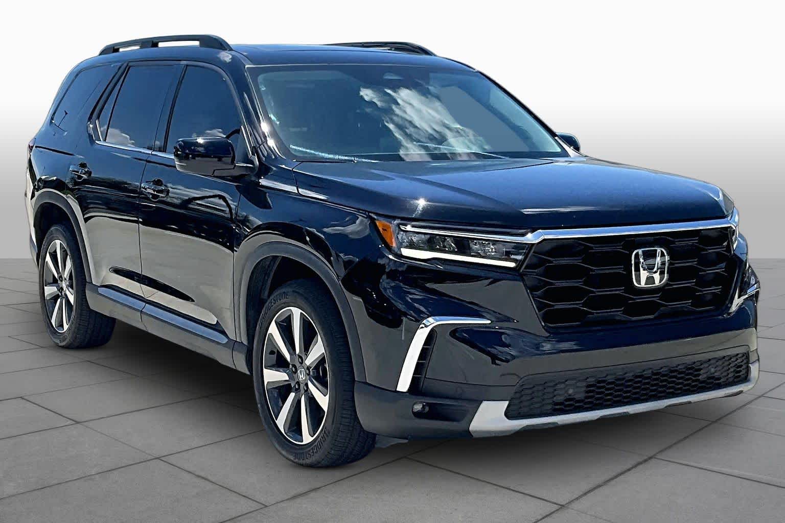 2024 Honda Pilot Touring Crystal Black Pearl at Tomball Ford