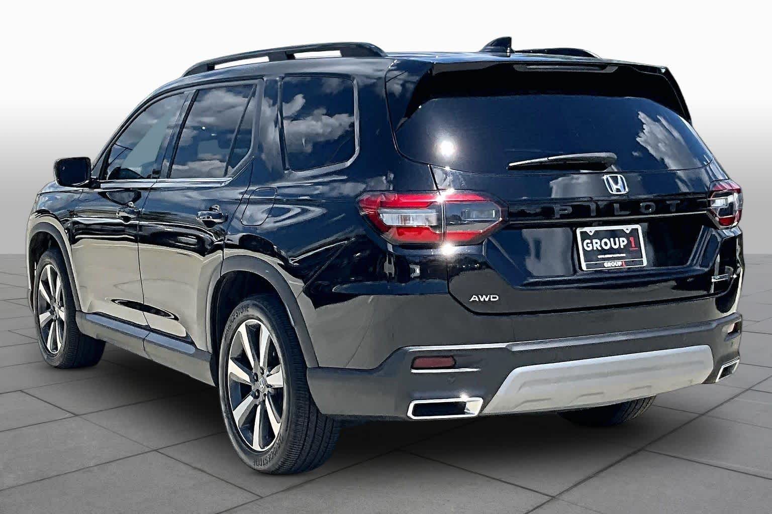 2024 Honda Pilot Touring Crystal Black Pearl at Tomball Ford