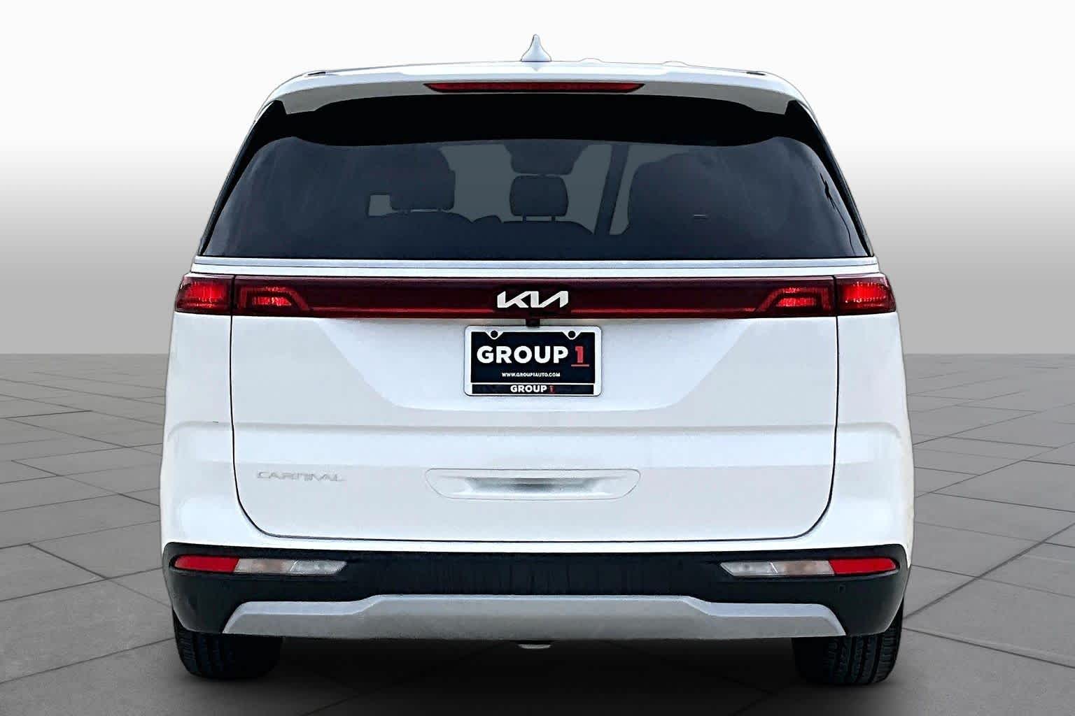 2023 Kia Carnival EX Snow White Pearl at Tomball Chrysler Dodge Jeep Ram