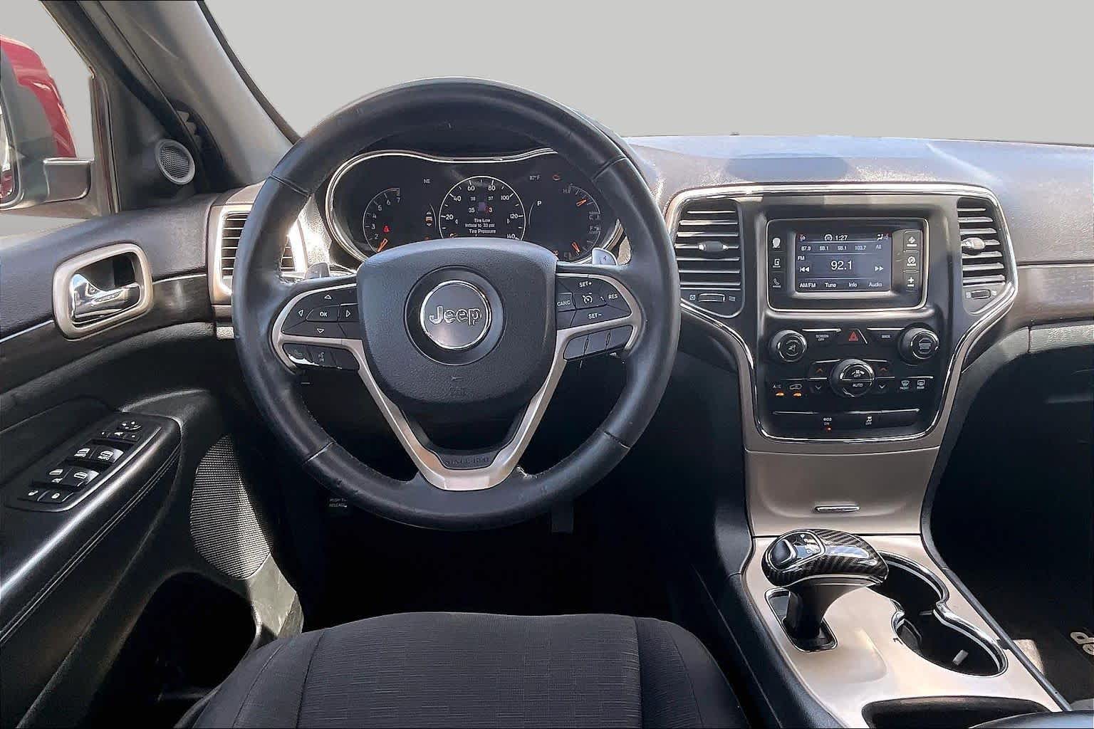 2014 Jeep Grand Cherokee Laredo Deep Cherry Red Crystal Pearlcoat at Sterling McCall Nissan