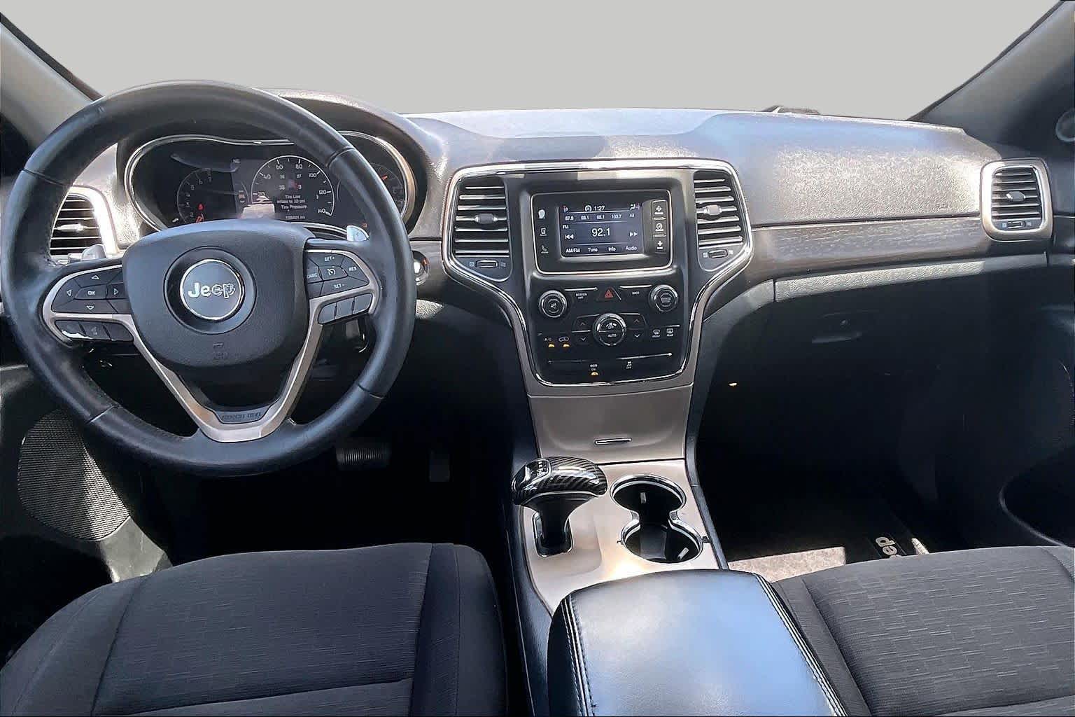 2014 Jeep Grand Cherokee Laredo Deep Cherry Red Crystal Pearlcoat at Sterling McCall Nissan