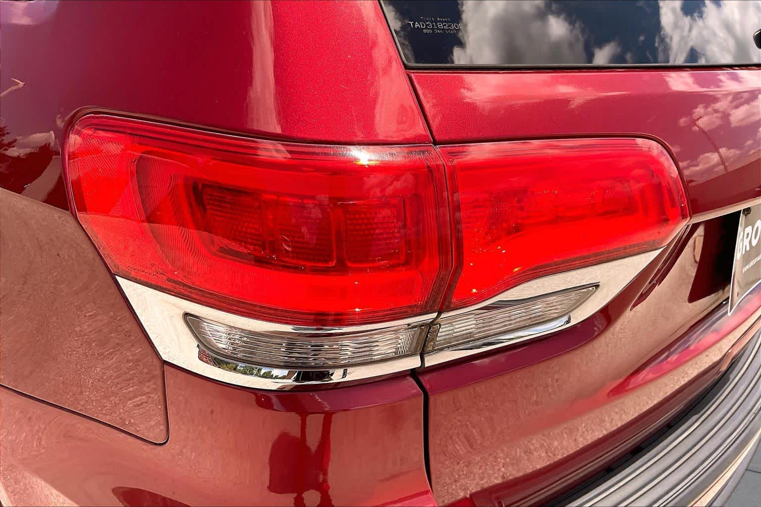 2014 Jeep Grand Cherokee Laredo Deep Cherry Red Crystal Pearlcoat at Sterling McCall Nissan