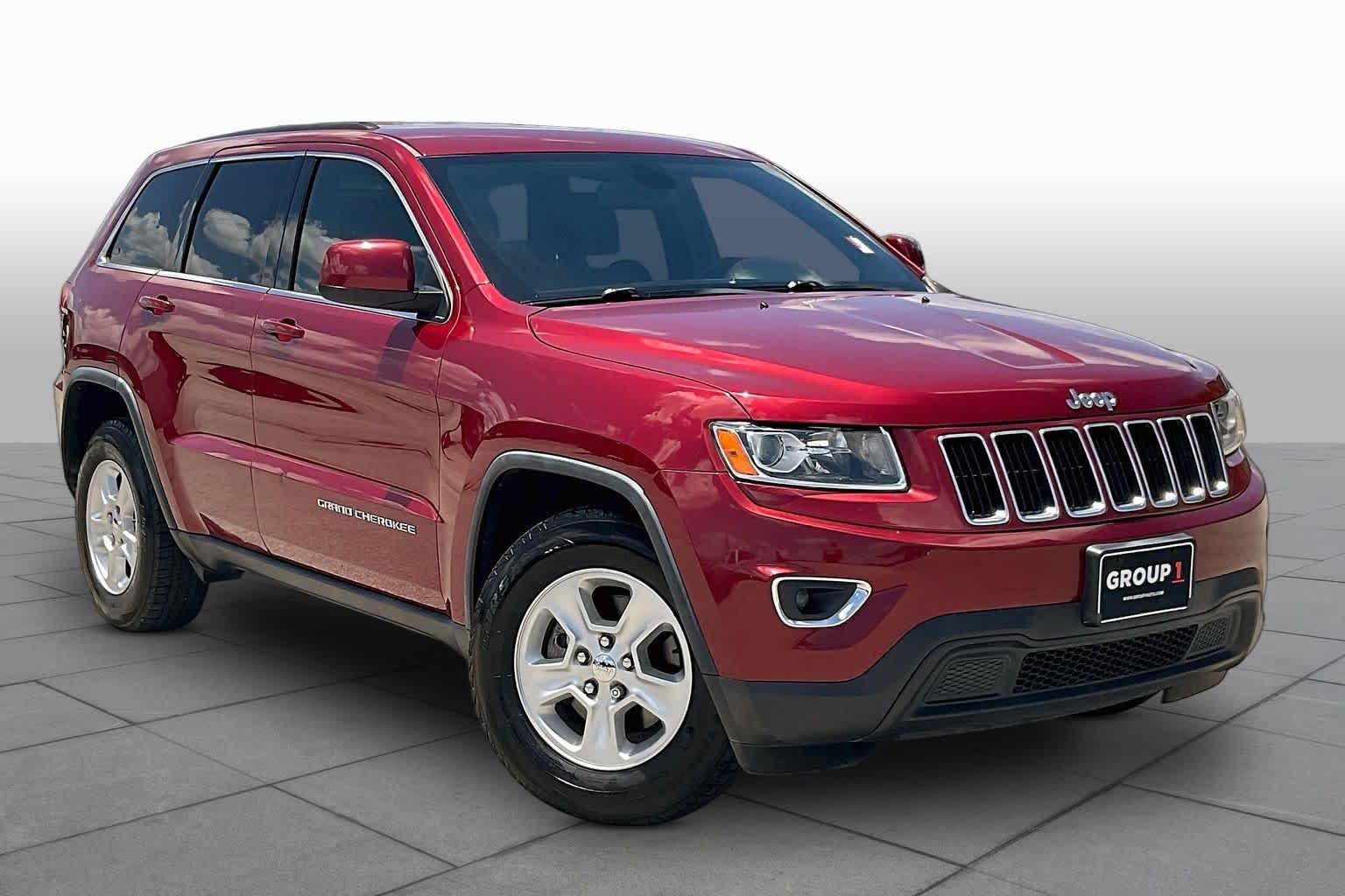 2014 Jeep Grand Cherokee Laredo Deep Cherry Red Crystal Pearlcoat at Sterling McCall Nissan