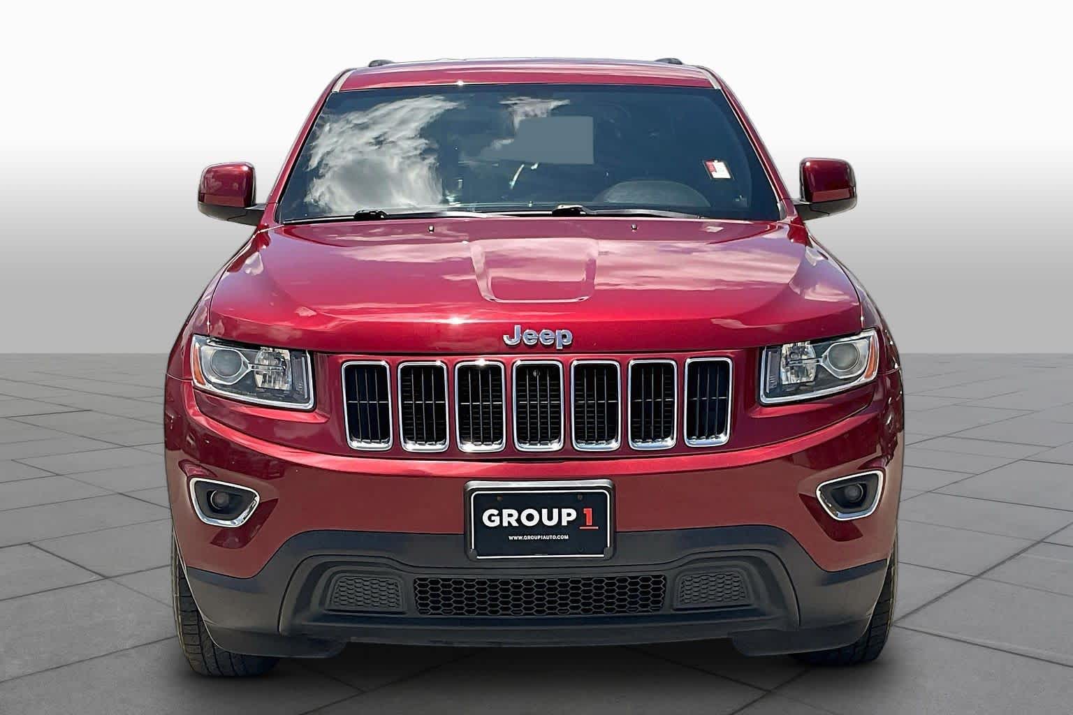 2014 Jeep Grand Cherokee Laredo Deep Cherry Red Crystal Pearlcoat at Sterling McCall Nissan